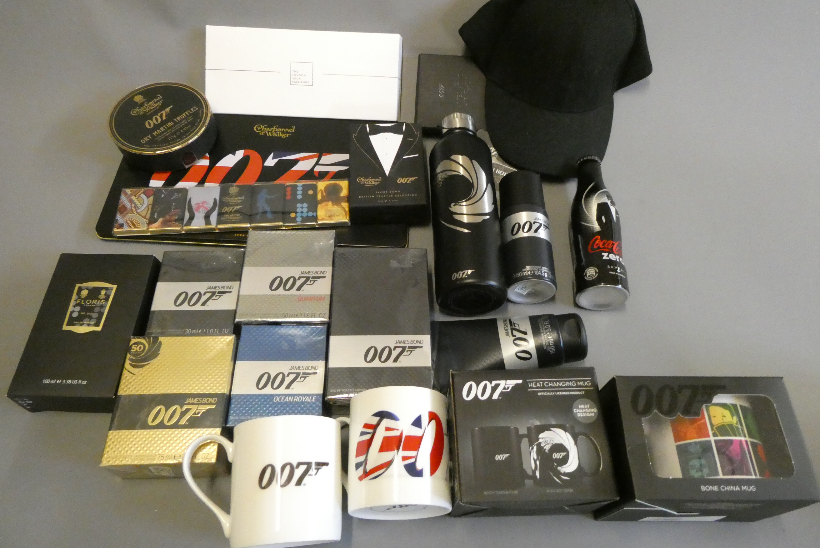 James Bond themed consumables including after-shave, soap, chocolate, socks, mugs and water bottle, Image