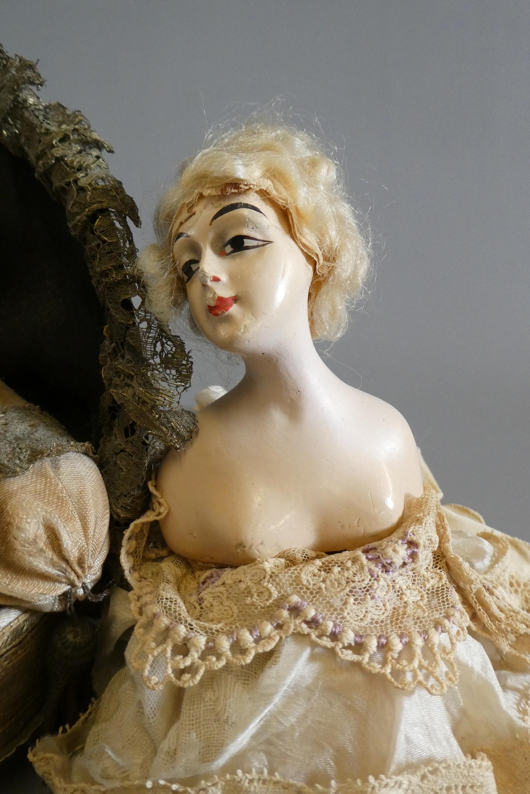 Four pin cushion and two fashion dolls Image