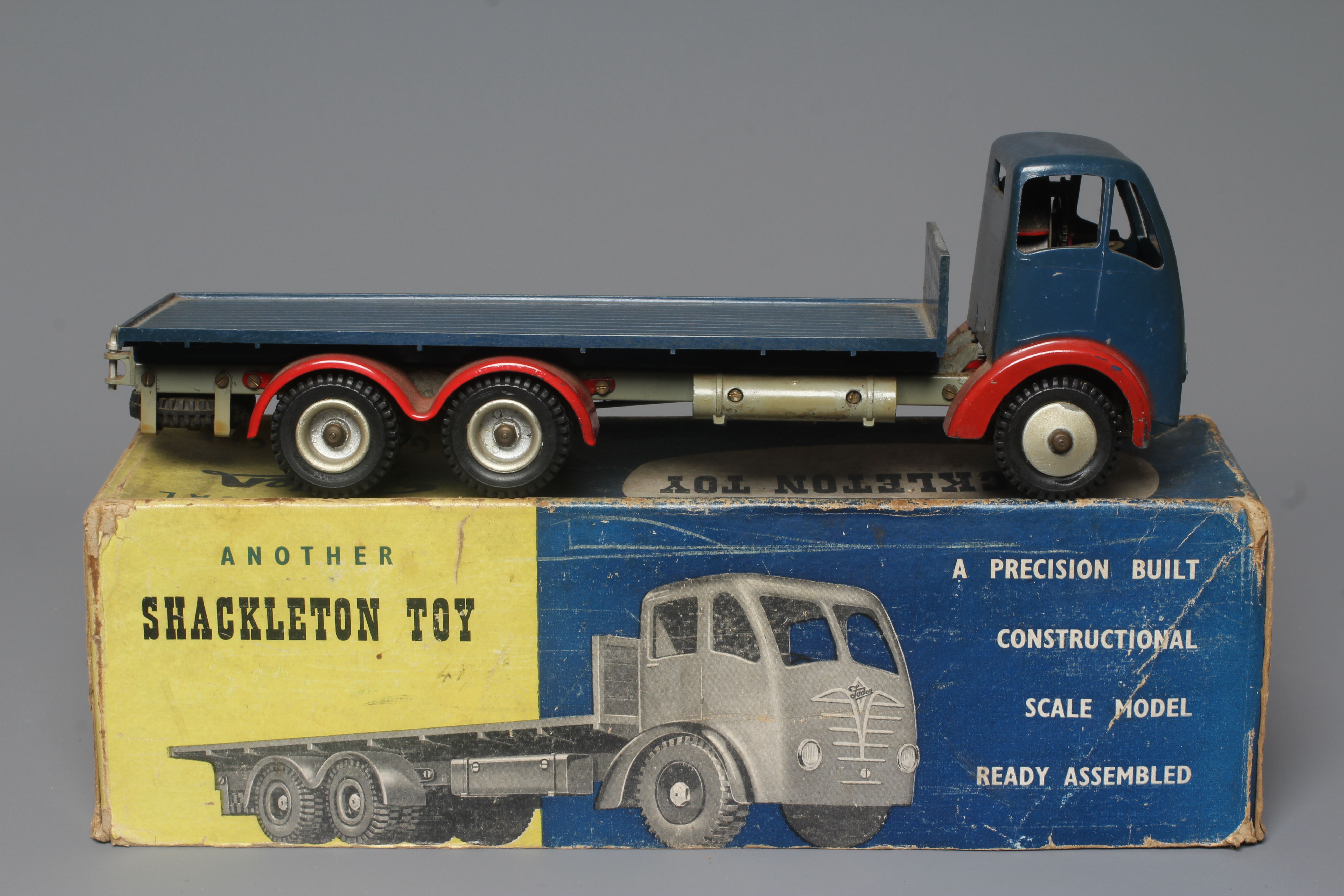 Shackleton clockwork Foden flat bed lorry finished in blue with key and instructions Image