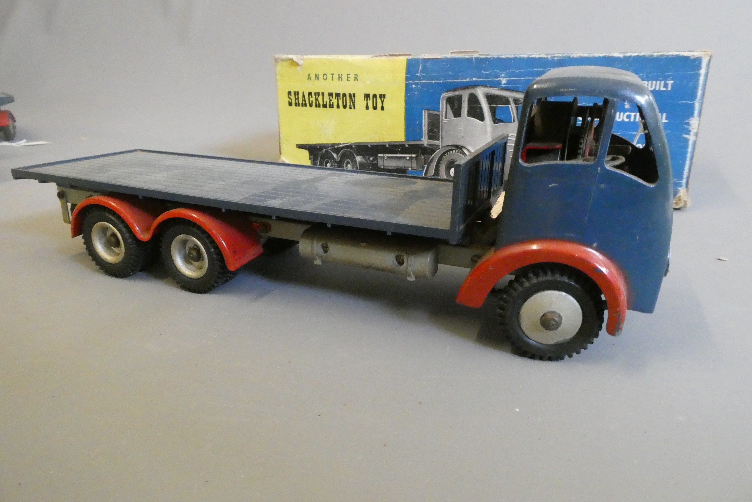 Shackleton clockwork Foden flat bed lorry finished in blue with key and instructions Image