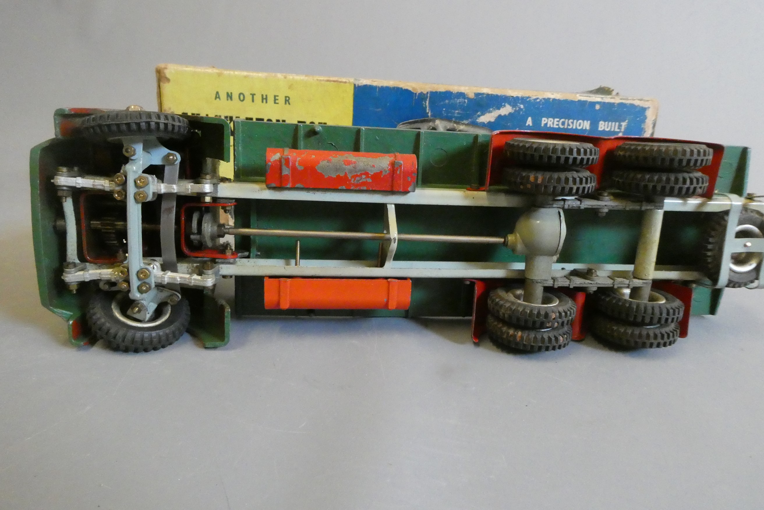 Shackleton clockwork Foden flatbed lorry finished in green, clockwork motor faulty, some damage to Image