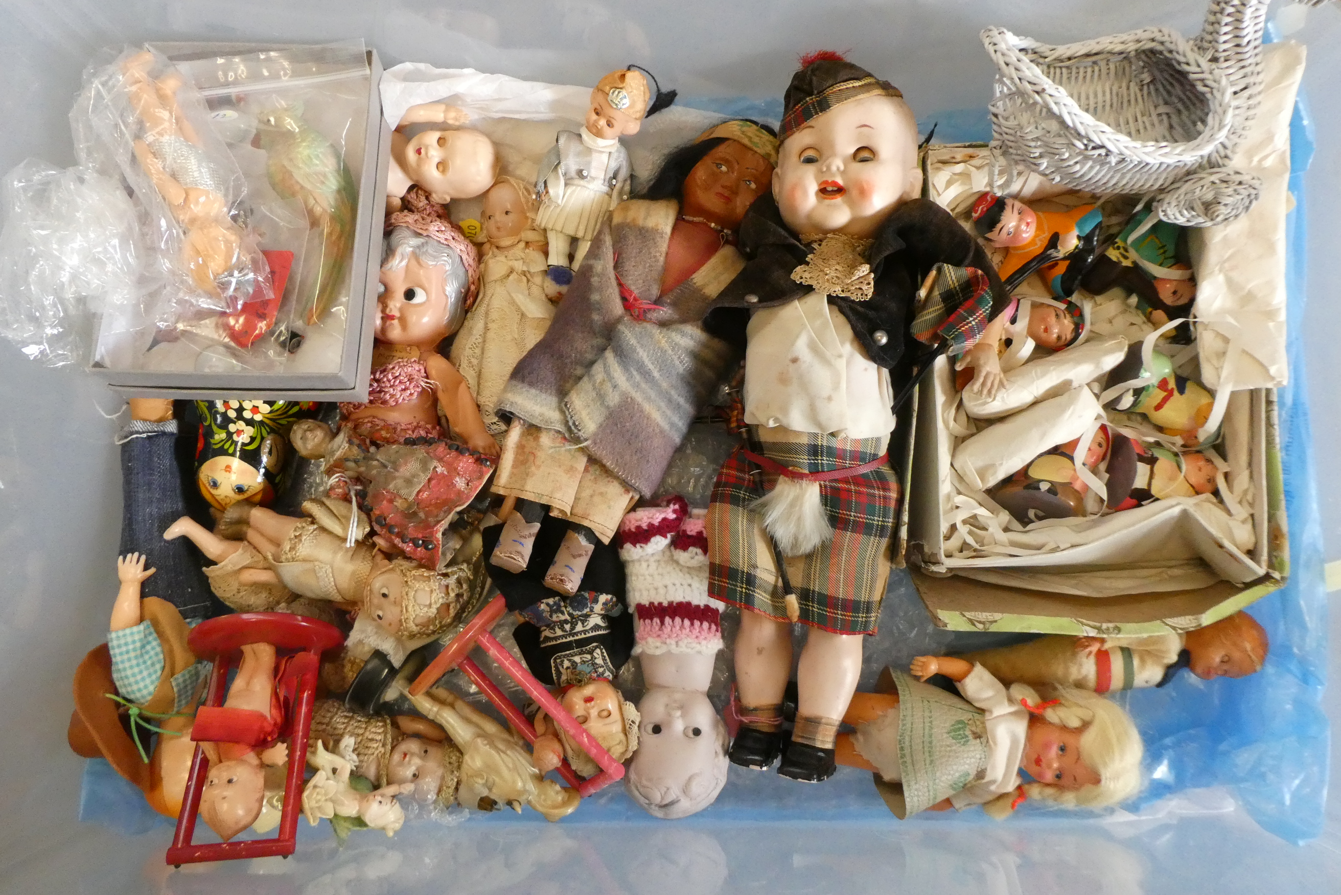 A box of vintage doll's including celluloid, bisque and composition examples (Est. plus 24% buyer's Image