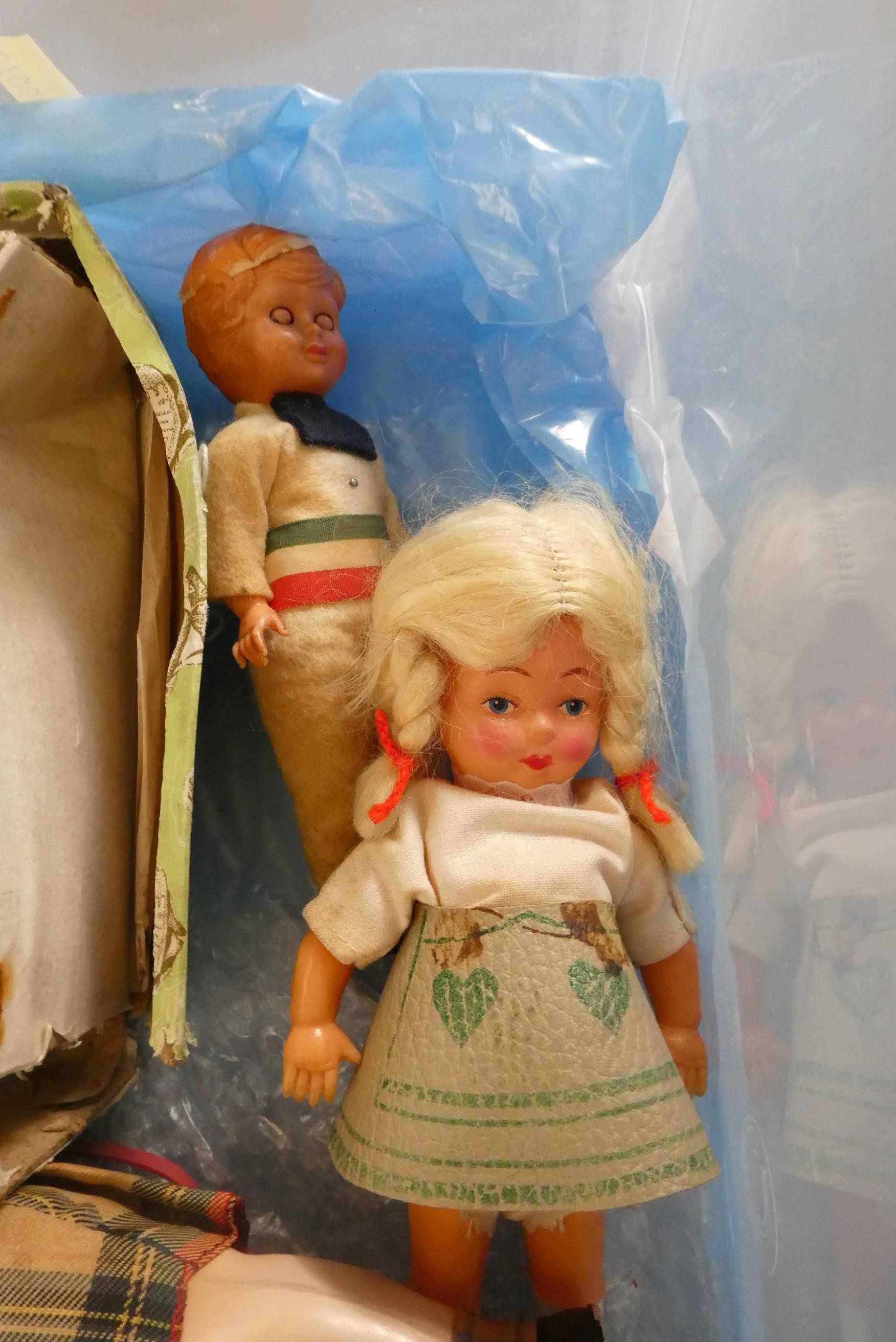 A box of vintage doll's including celluloid, bisque and composition examples (Est. plus 24% buyer's Image