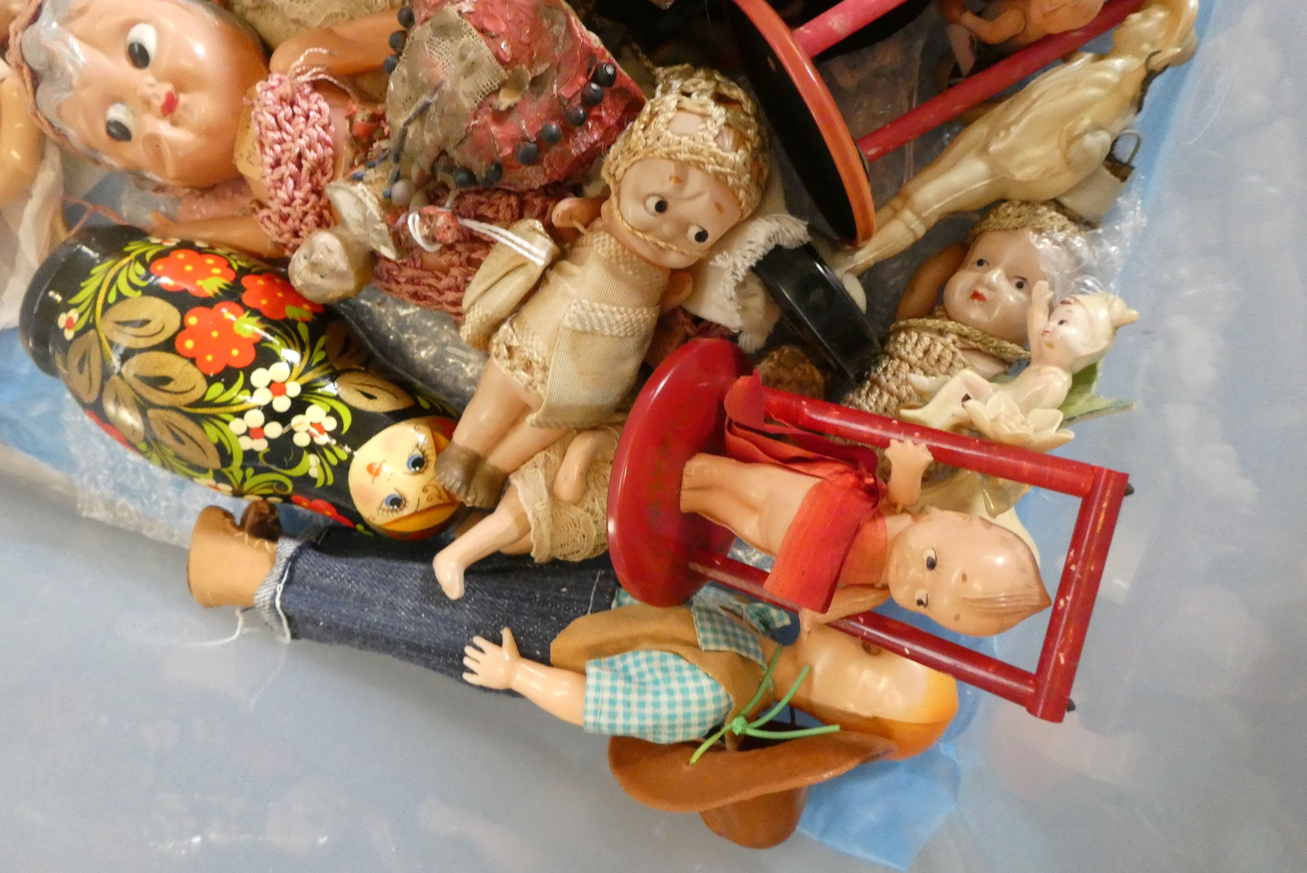 A box of vintage doll's including celluloid, bisque and composition examples (Est. plus 24% buyer's Image