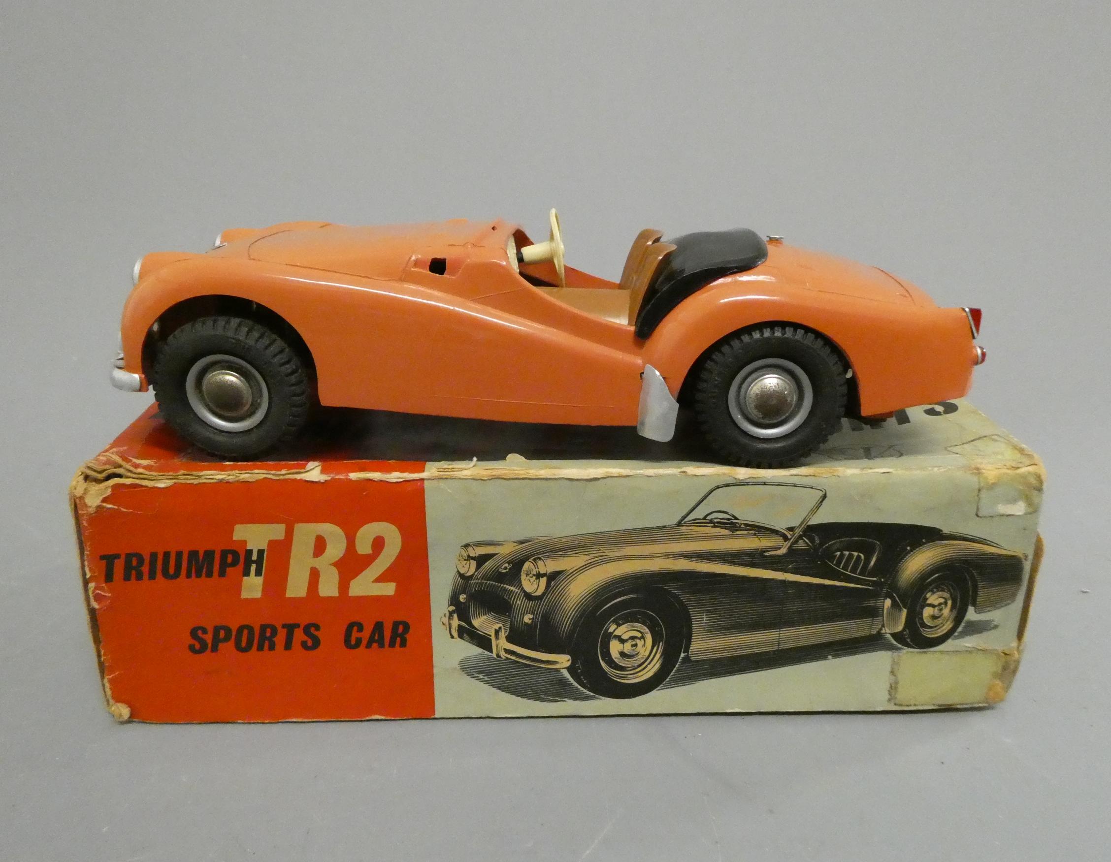 Victory Industries TR2 battery operated sports car in pink, body and chassis good but the windscreen Image