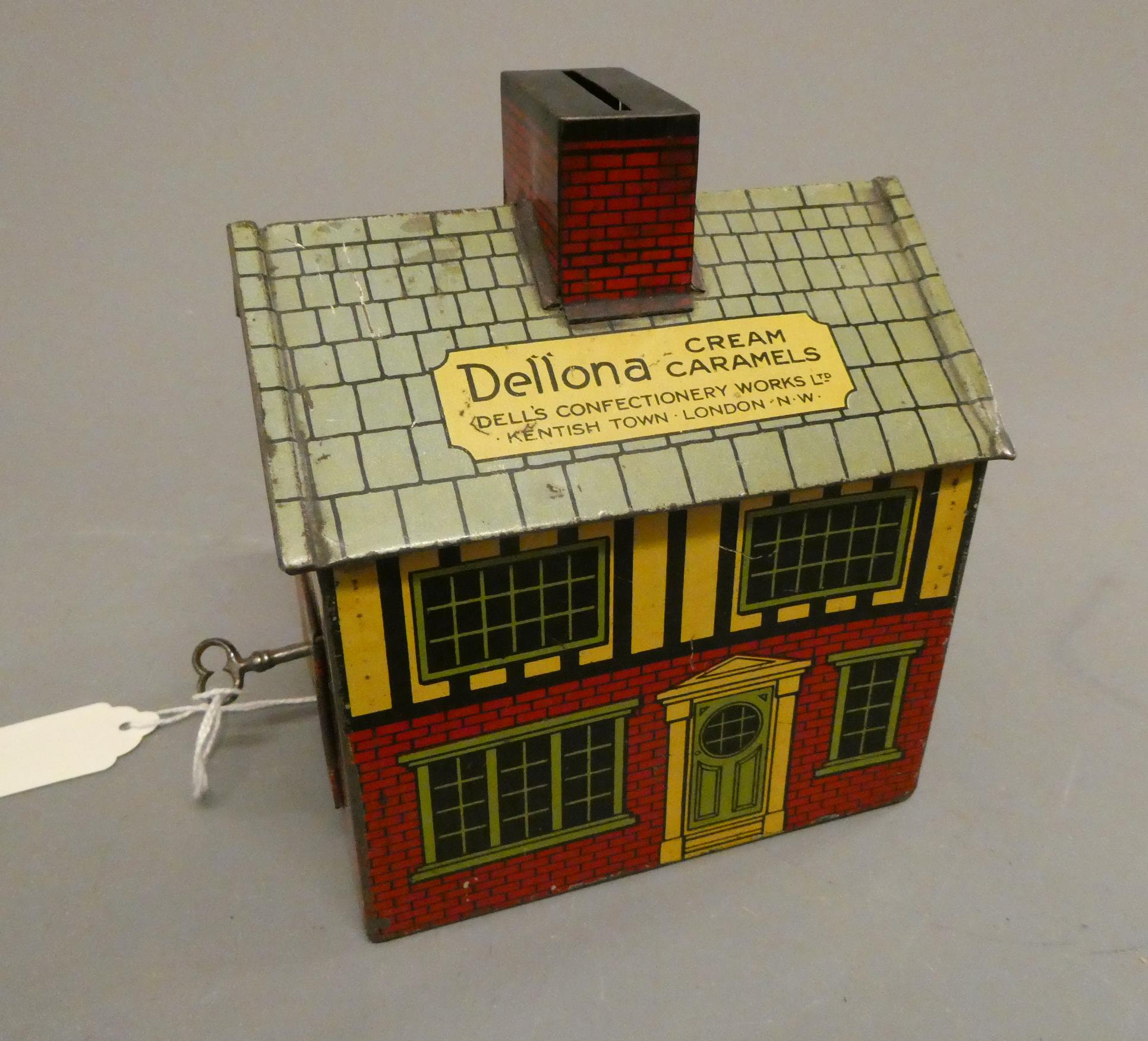 Printed tinplate money box from Dellona Cream Caramels complete with key to give access through one Image