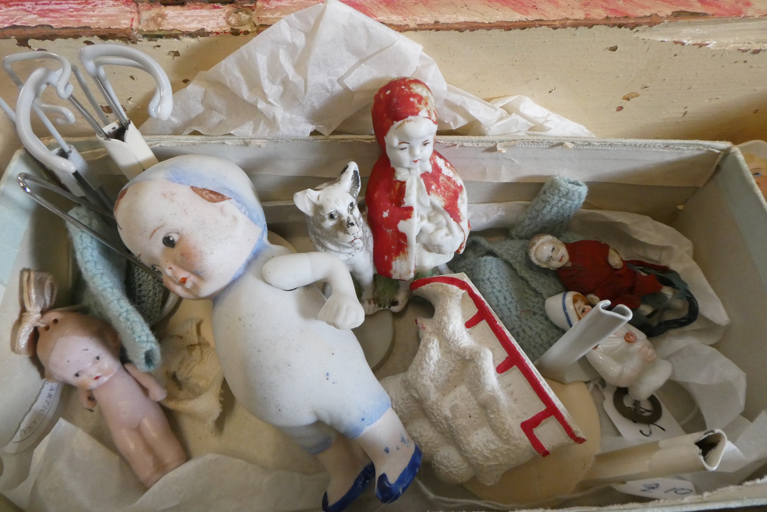 A chest of doll's house and miniature dolls and models, mainly bisque, including three jointed Image