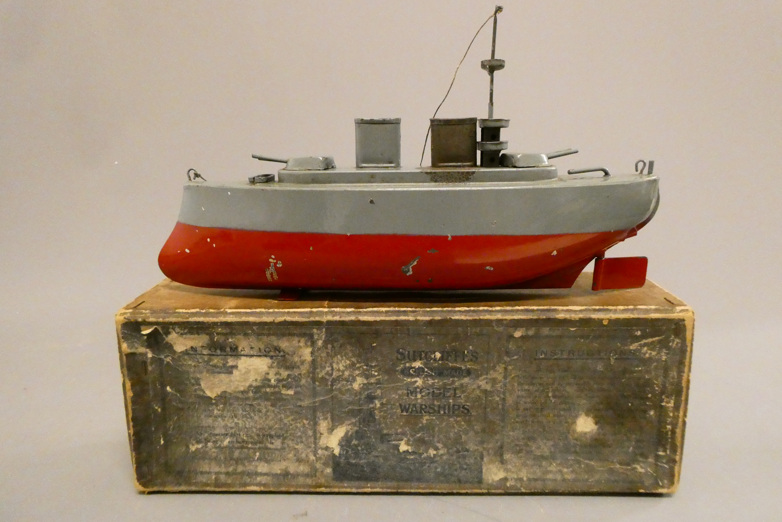 A Sutcliffe pre-war Toc-Toc powered Battleship, scorching to funnel, small dents and paint scratches Image