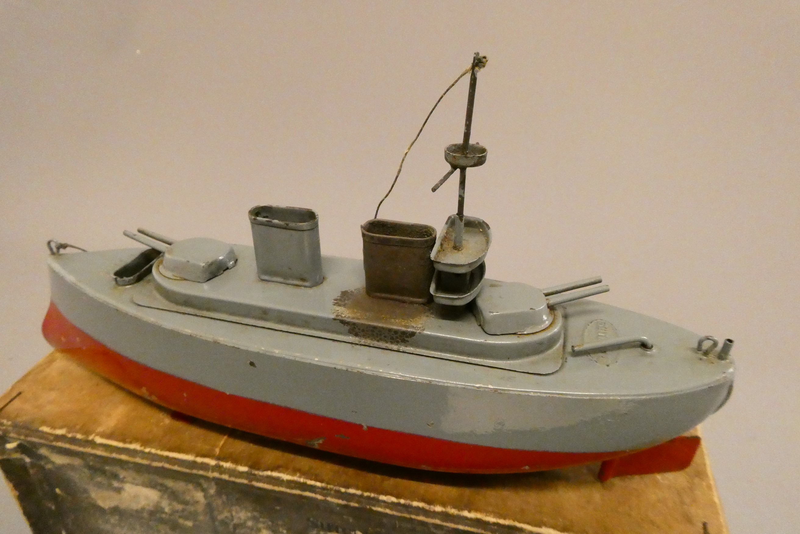 A Sutcliffe pre-war Toc-Toc powered Battleship, scorching to funnel, small dents and paint scratches Image