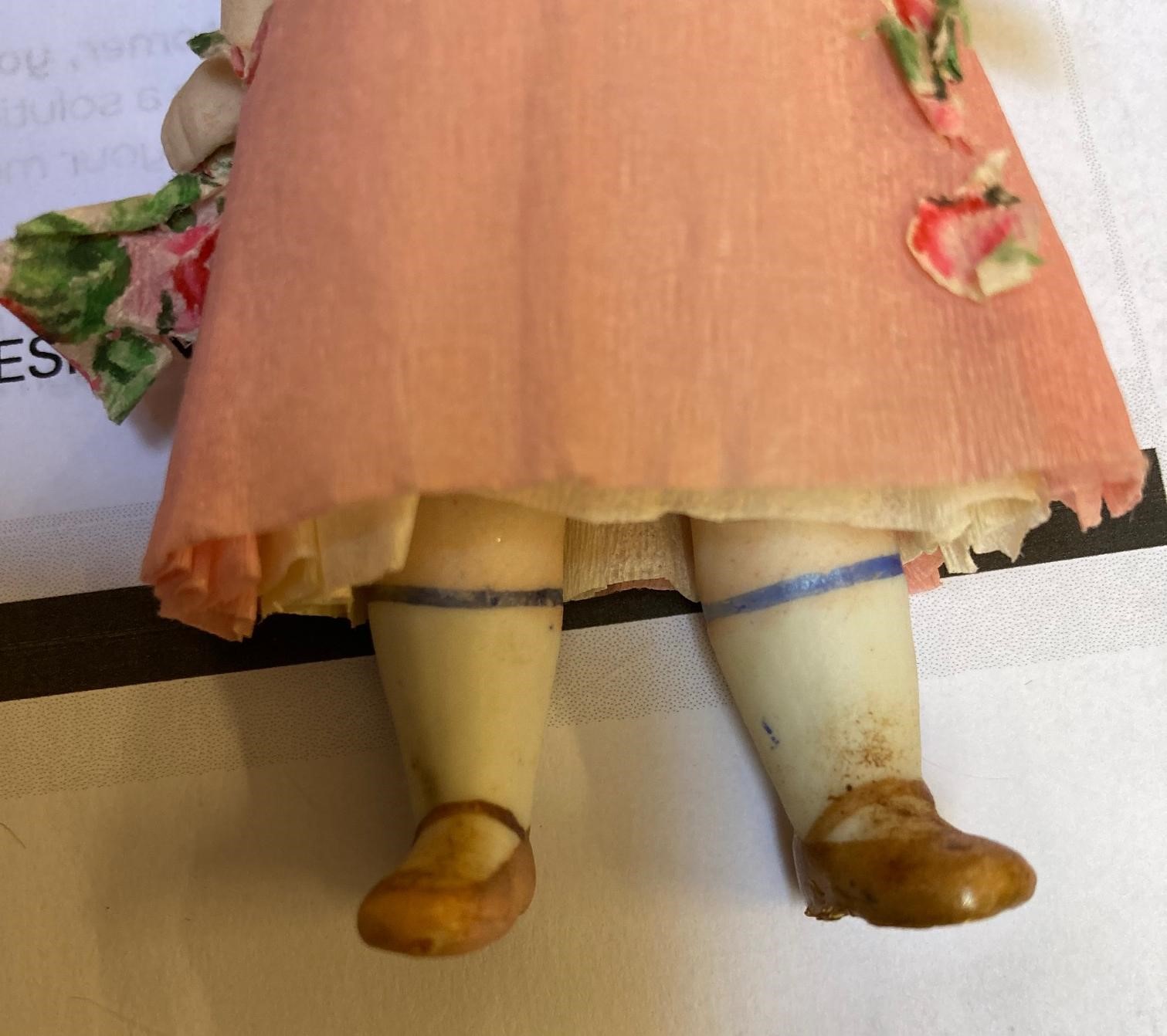 Four all bisque doll's house dolls all with jointed shoulders and hips Image