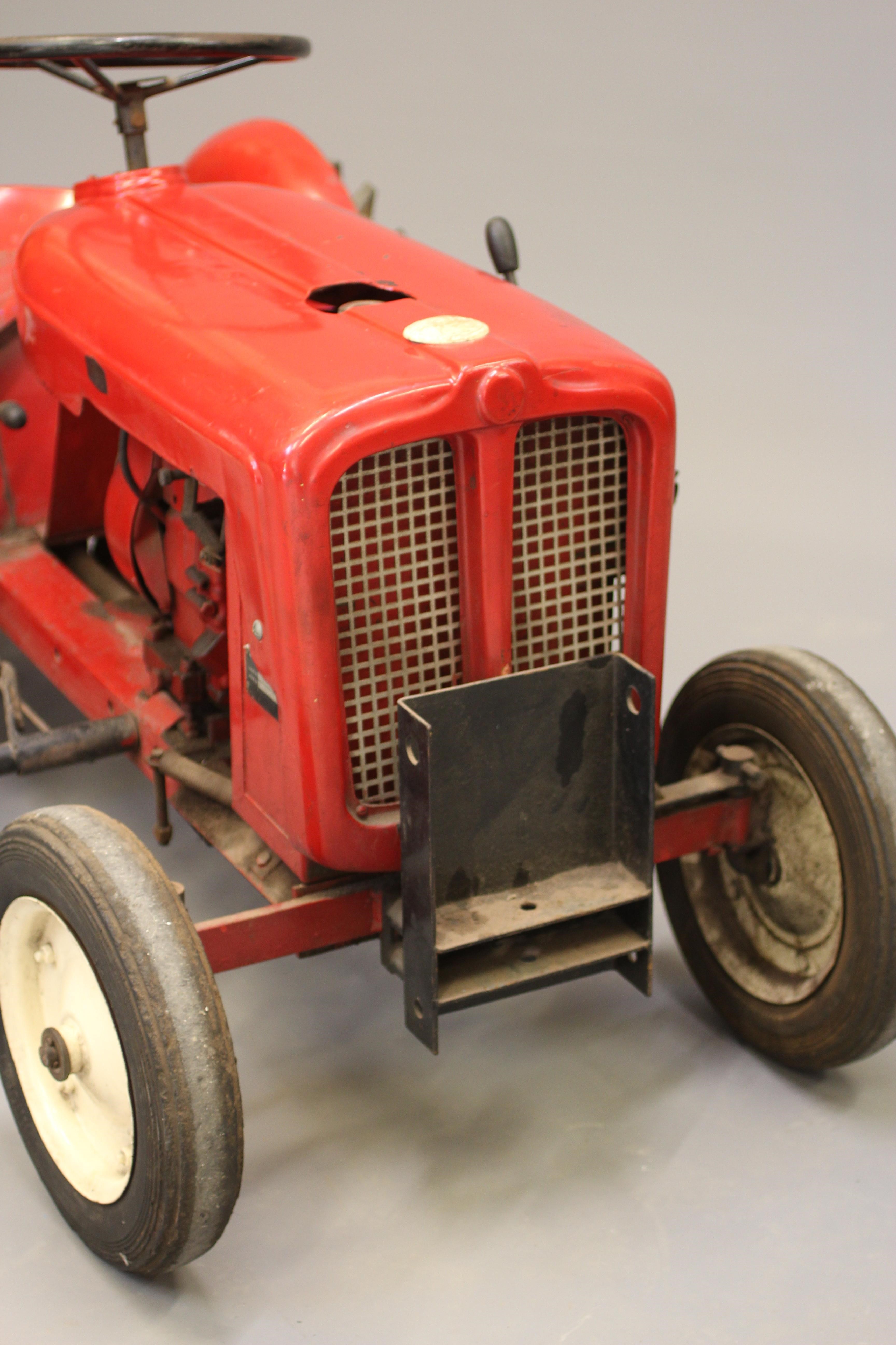 A Trojan miniature petrol driven tractor Image