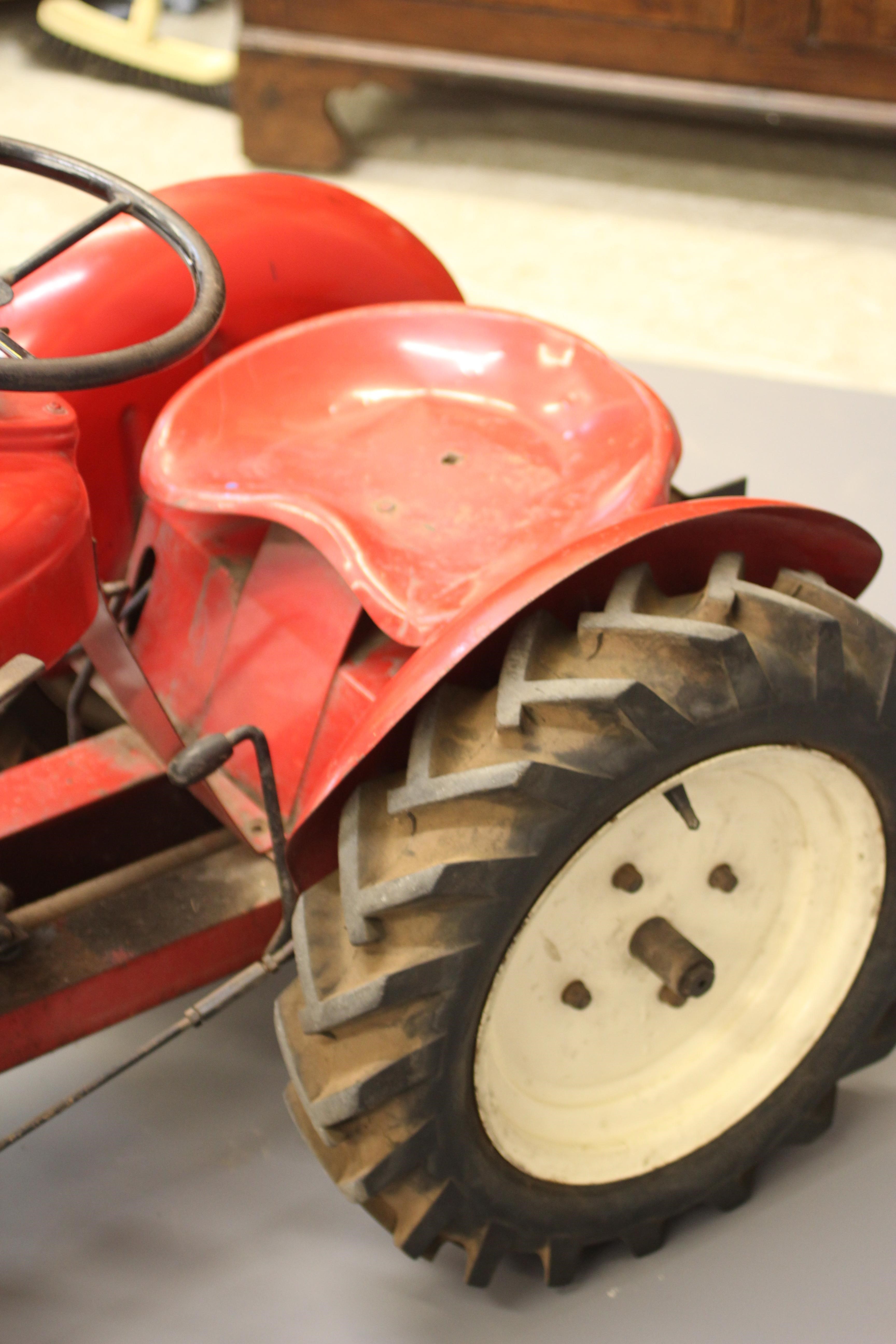 A Trojan miniature petrol driven tractor Image