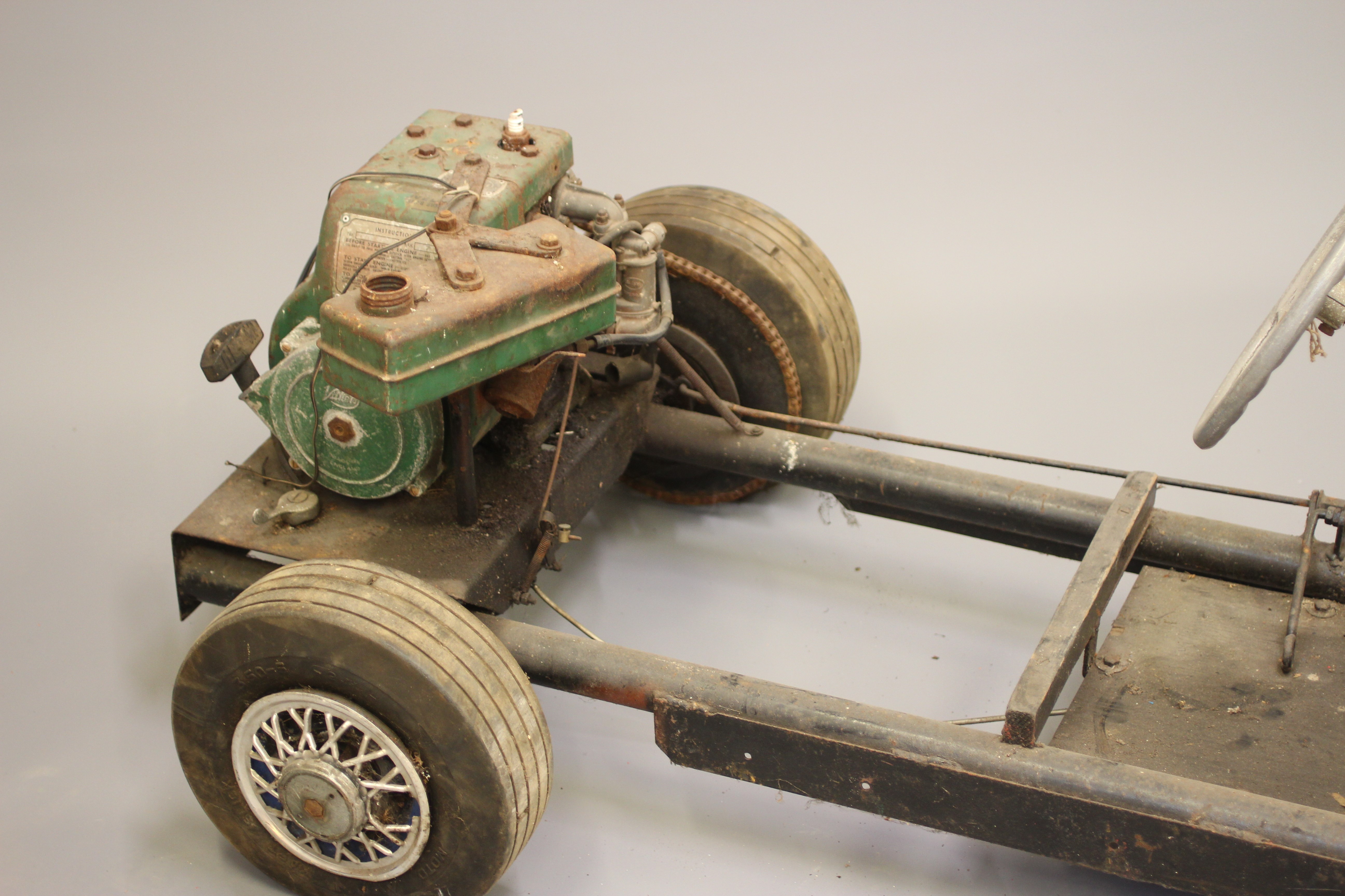 A Go-Cart size petrol driven model of a Jaguar D type. This car has a tubular frame chassis with a Image