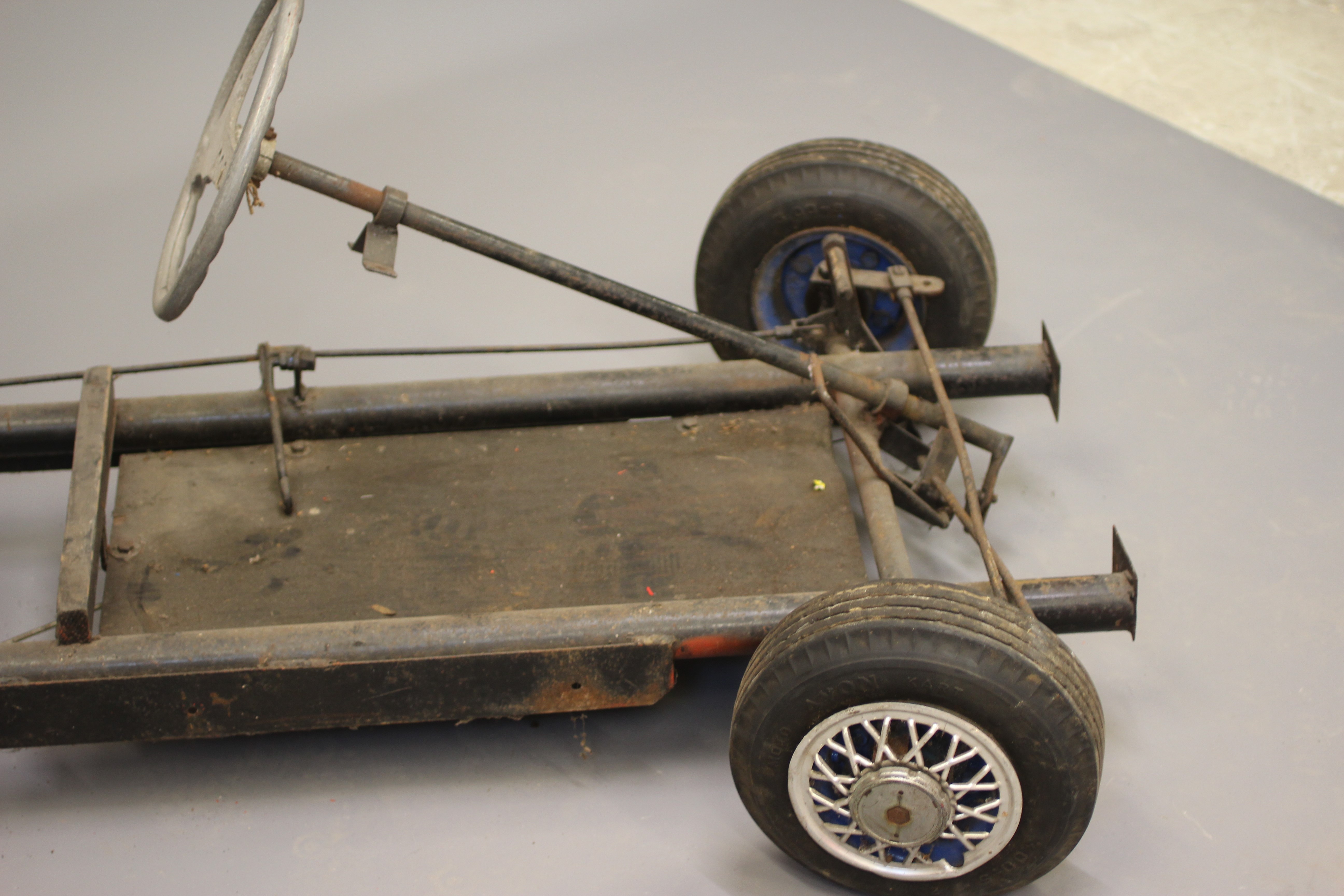 A Go-Cart size petrol driven model of a Jaguar D type. This car has a tubular frame chassis with a Image