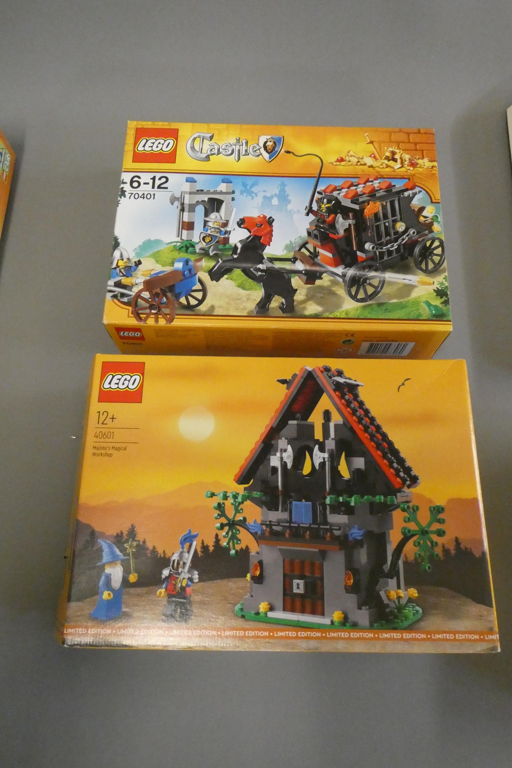 Five boxed Lego sets including Castle 3835/40601/70400/70401/70402 and a Brickmaster book set. Most Image