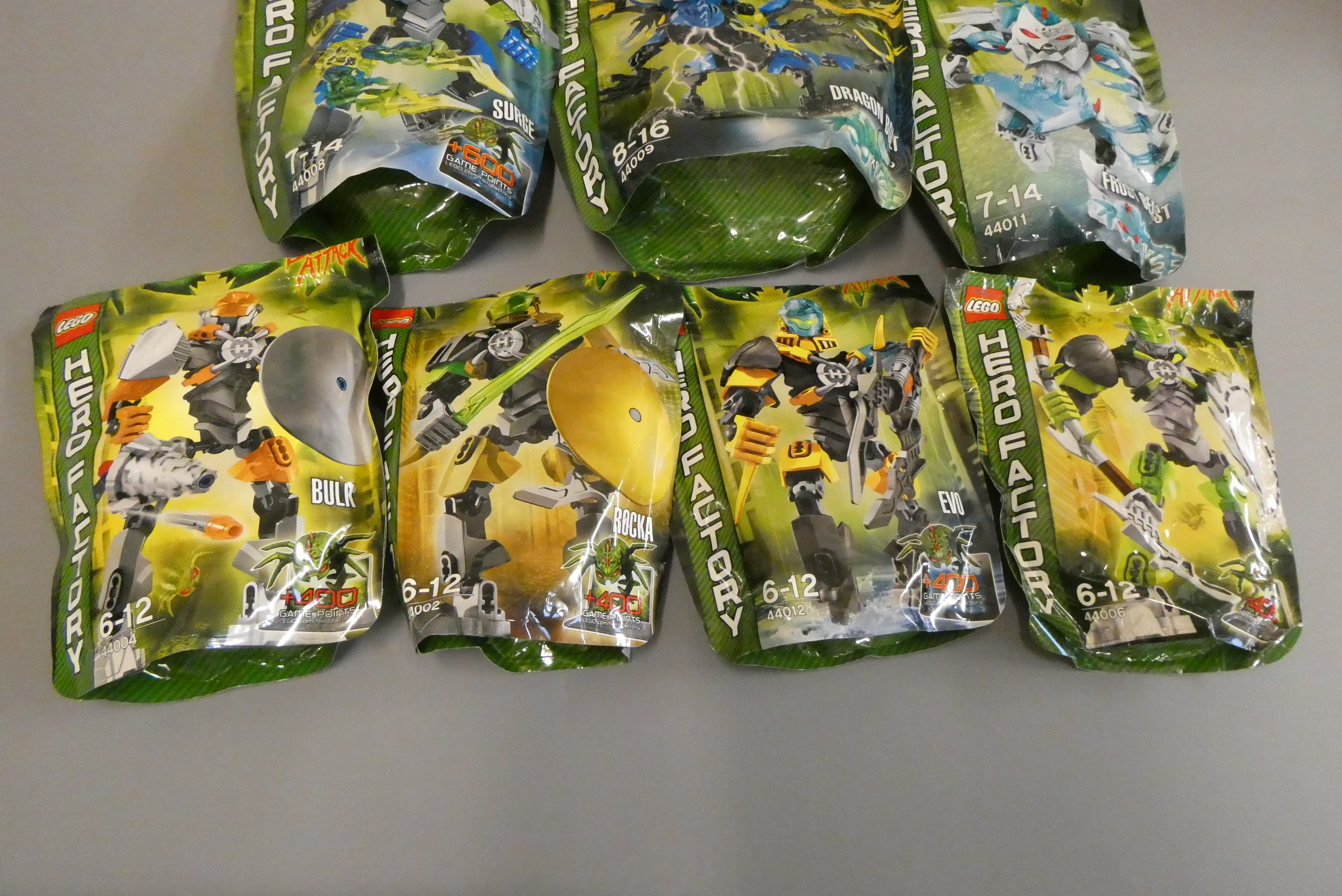 A collection of 10x Lego Hero Factory 'Brain Attack' collection bagged characters to include; Frost Image