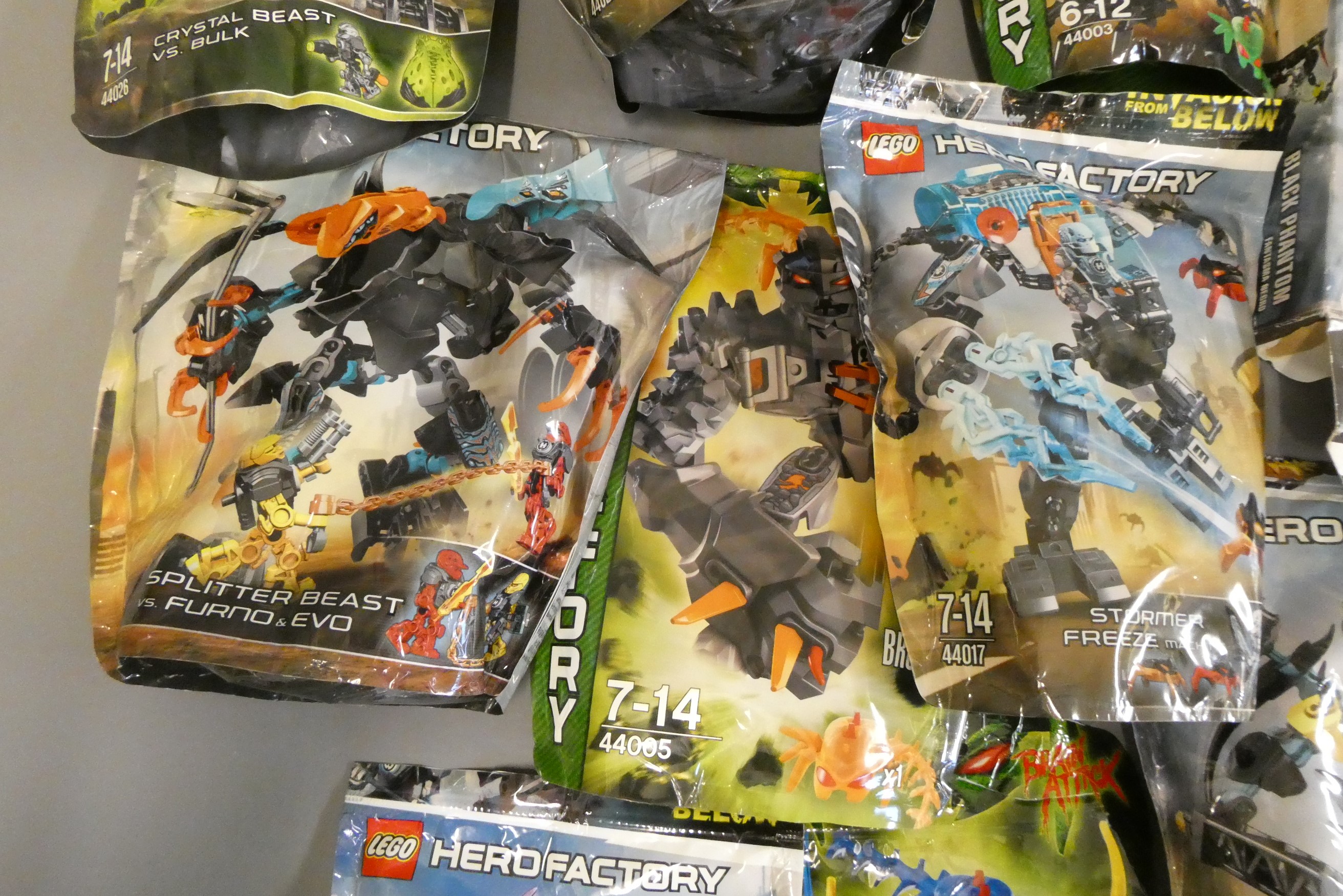A collection of 10x Lego Hero Factory 'Brain Attack' and 'Invasion from Below' bagged characters to Image