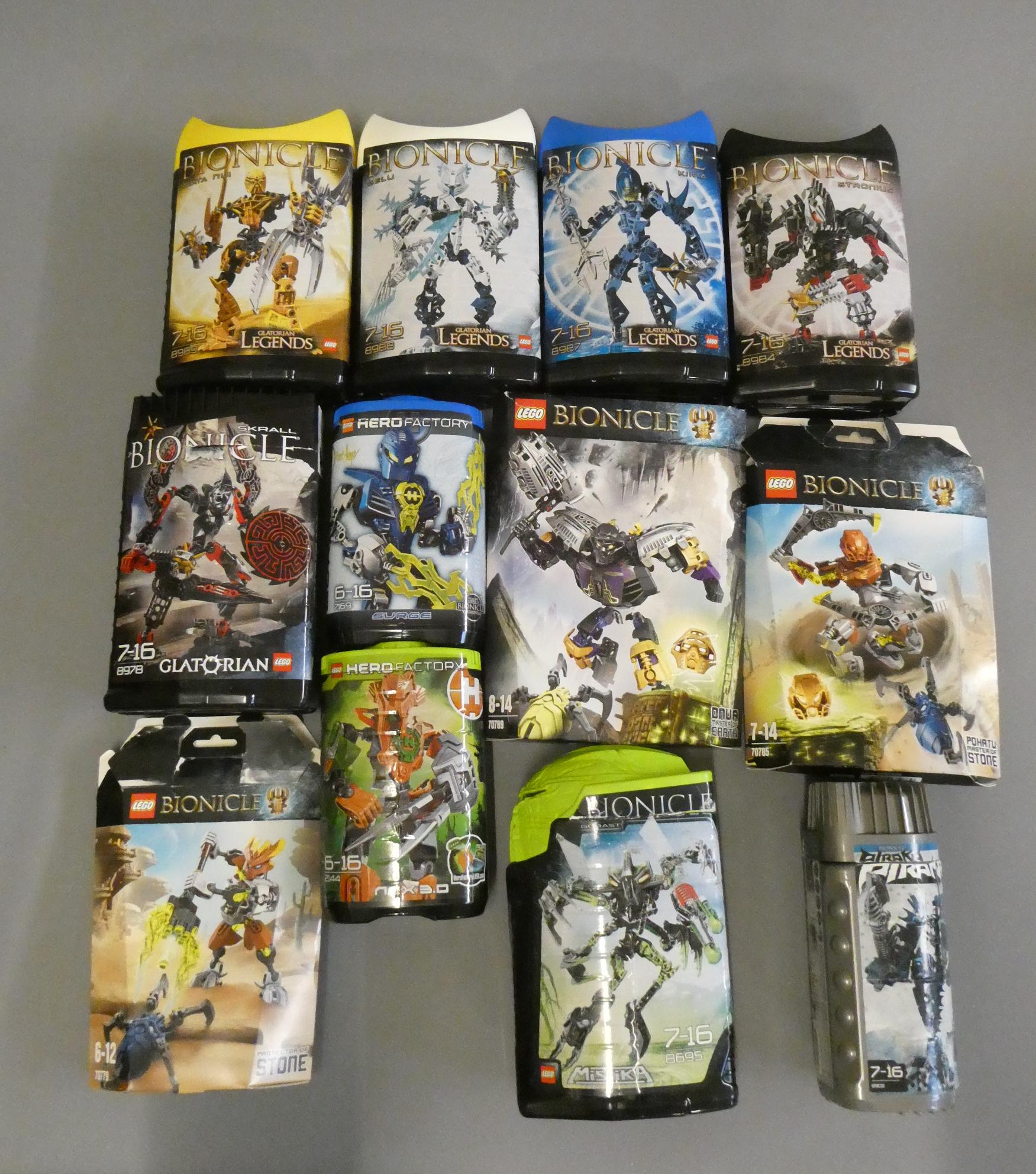 A collection of 12x boxed Lego Bionicle sets including Glatorian Legends examples Image
