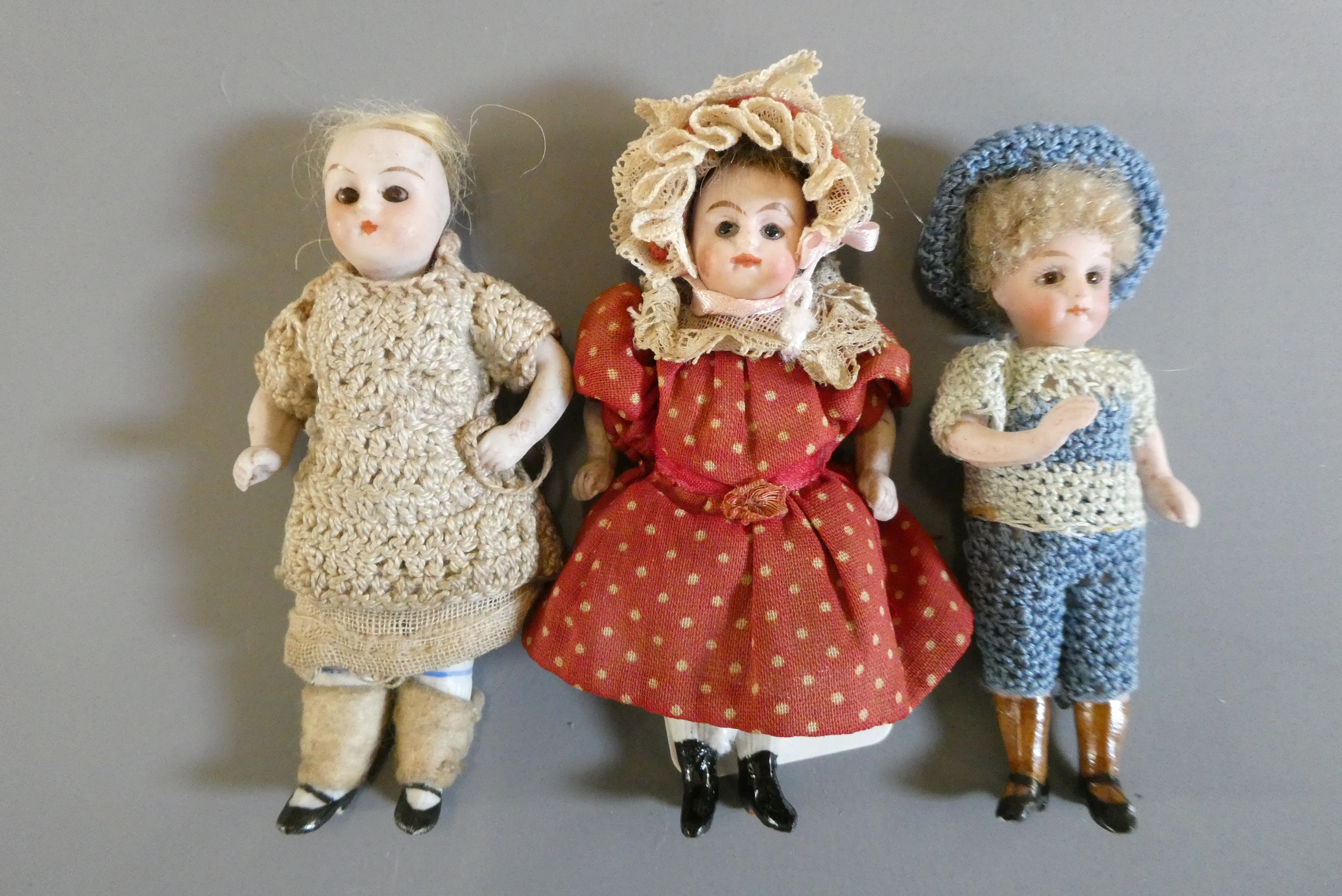 Three all bisque doll's house dolls Image