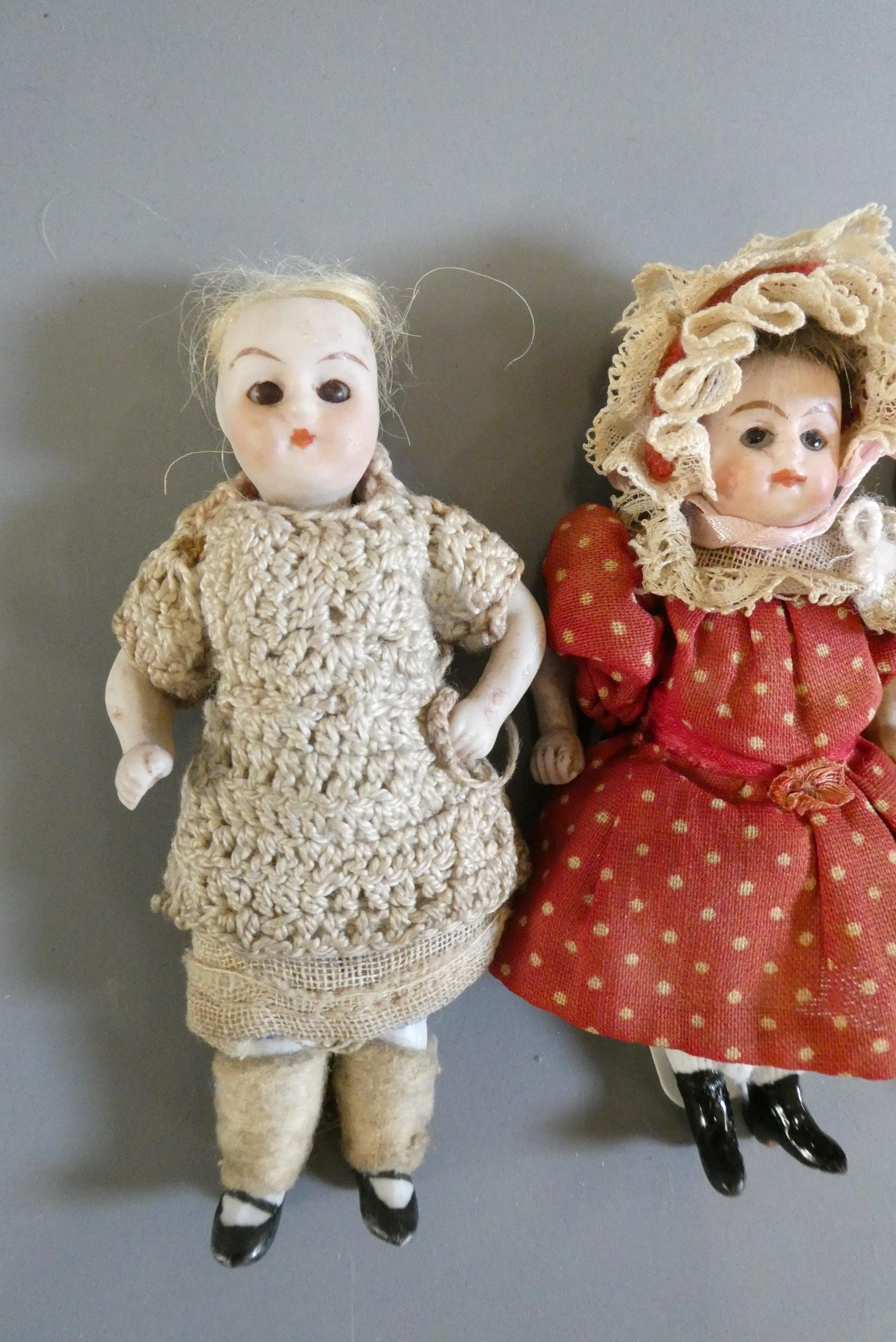 Three all bisque doll's house dolls Image