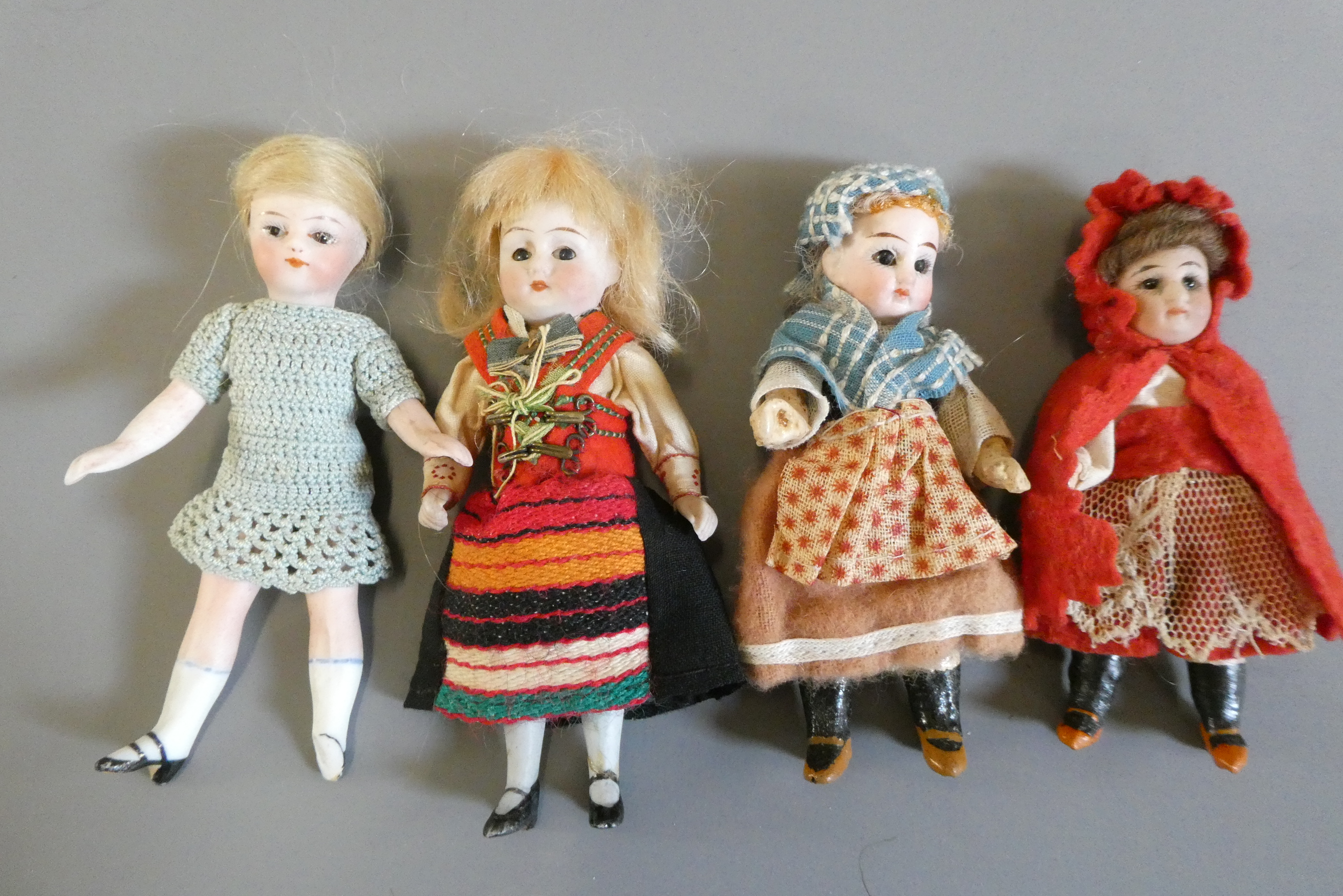 Four doll's house dolls Image