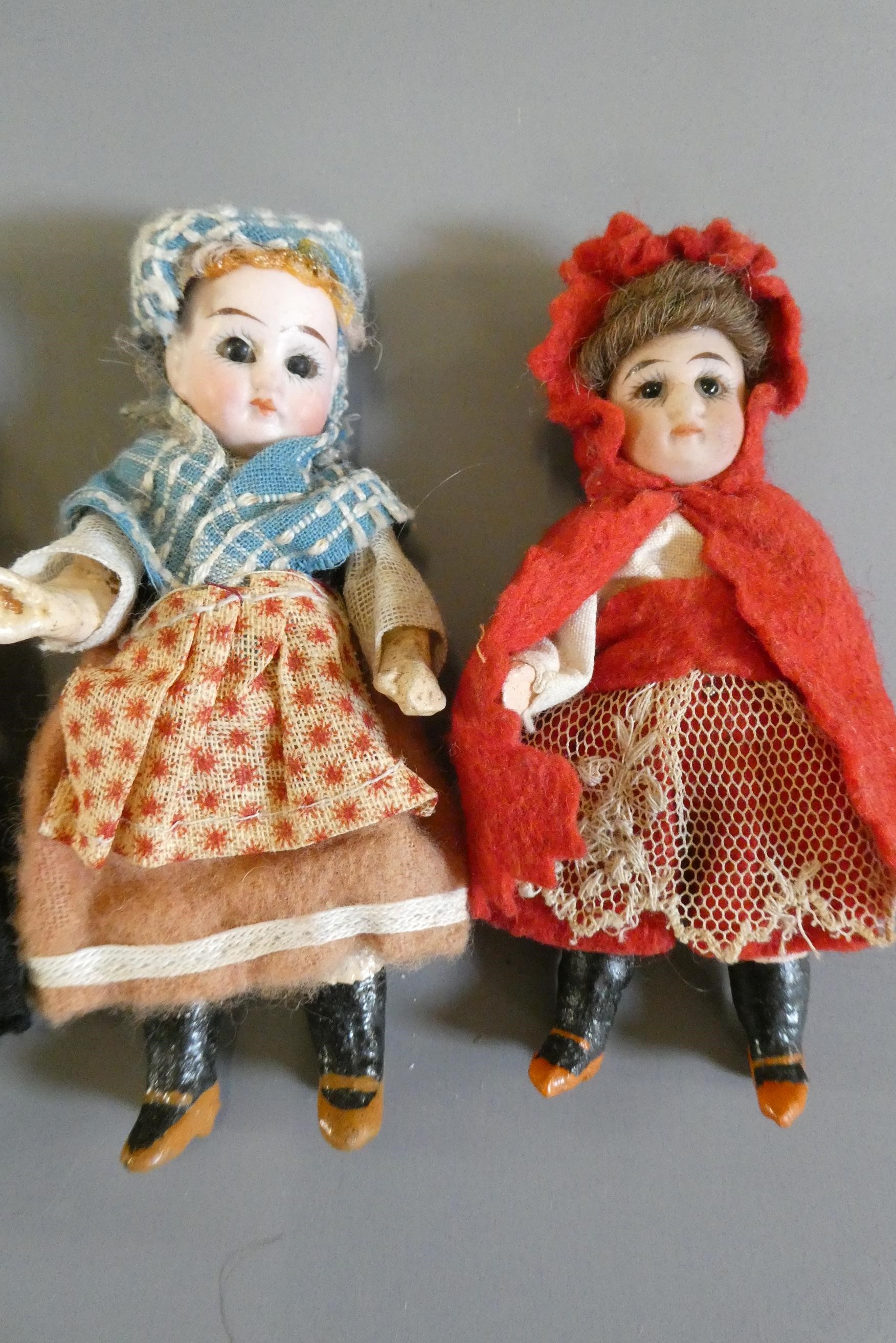 Four doll's house dolls Image