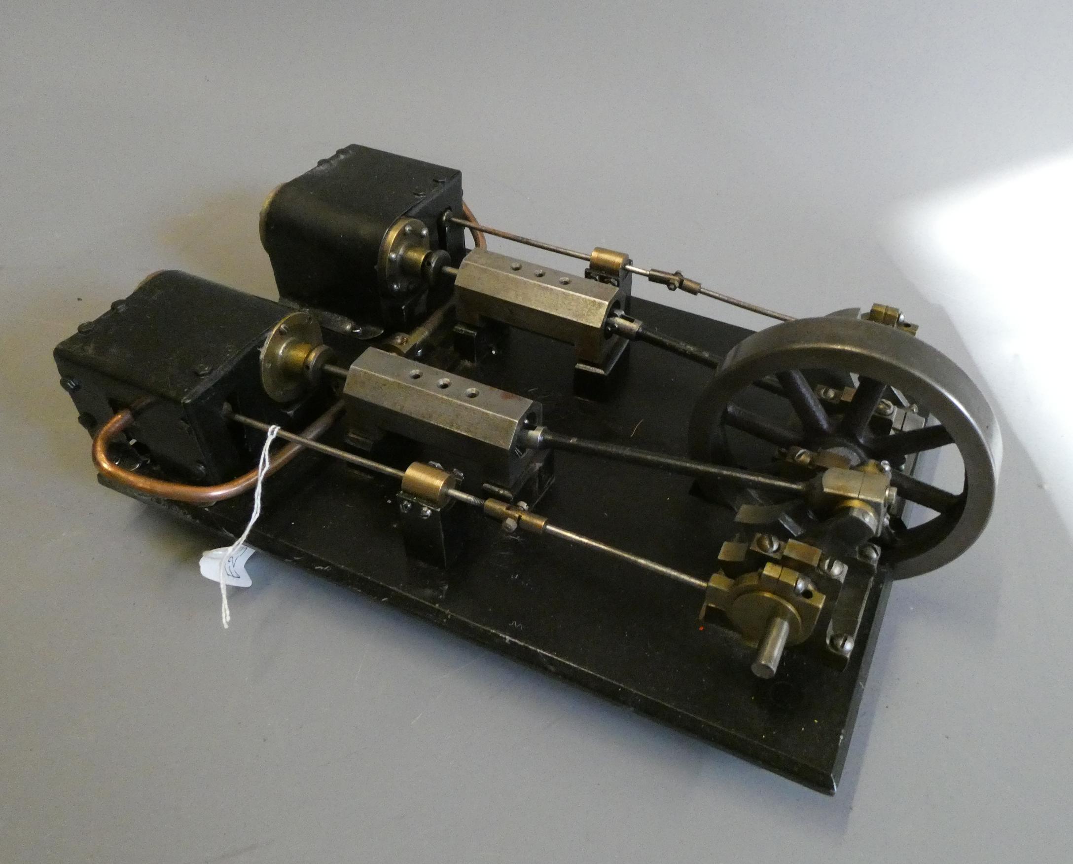 Large twin cylinder horizontal steam engine constructed from steel fabrications with cast fly wheel, Image