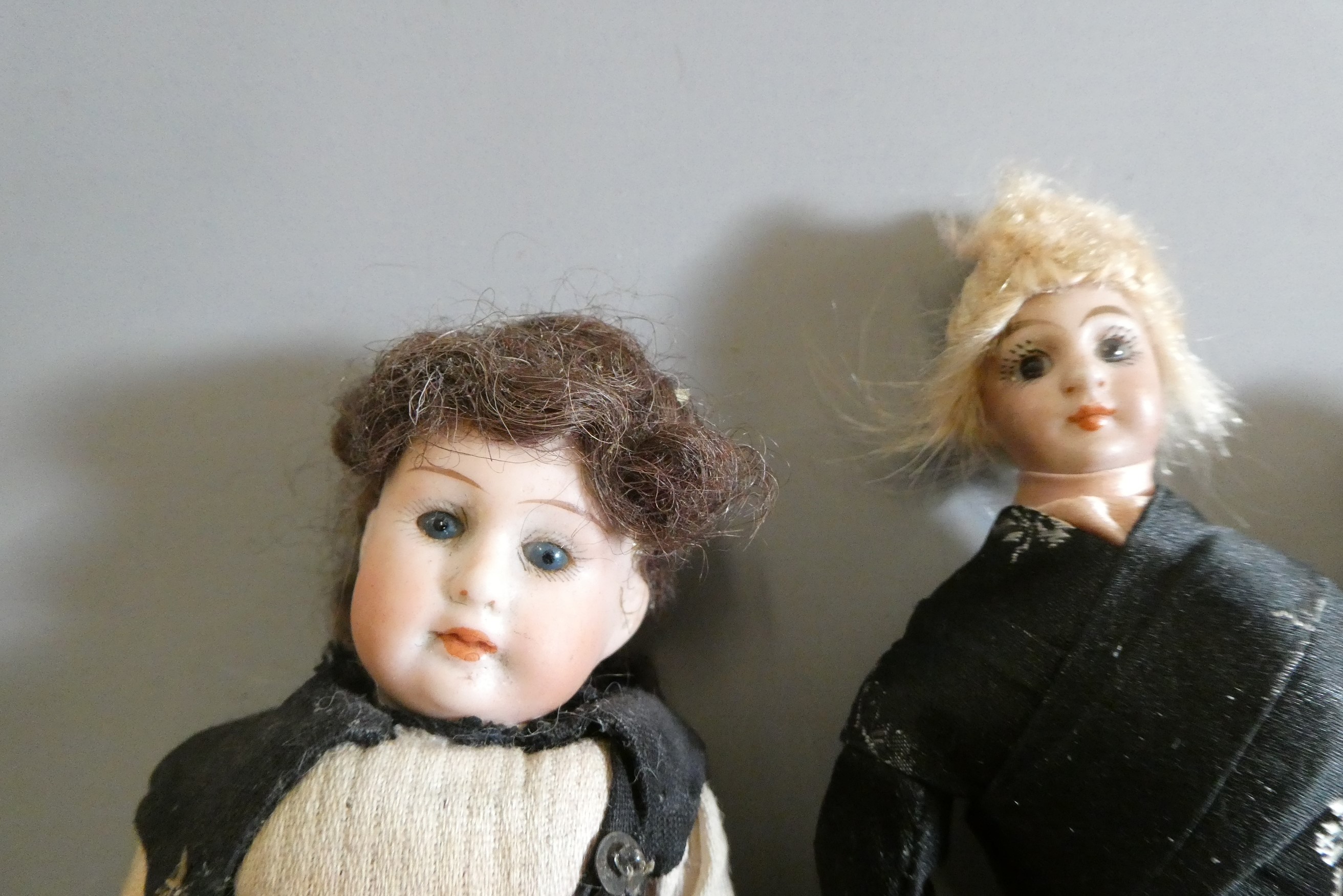 Three doll's house dolls Image