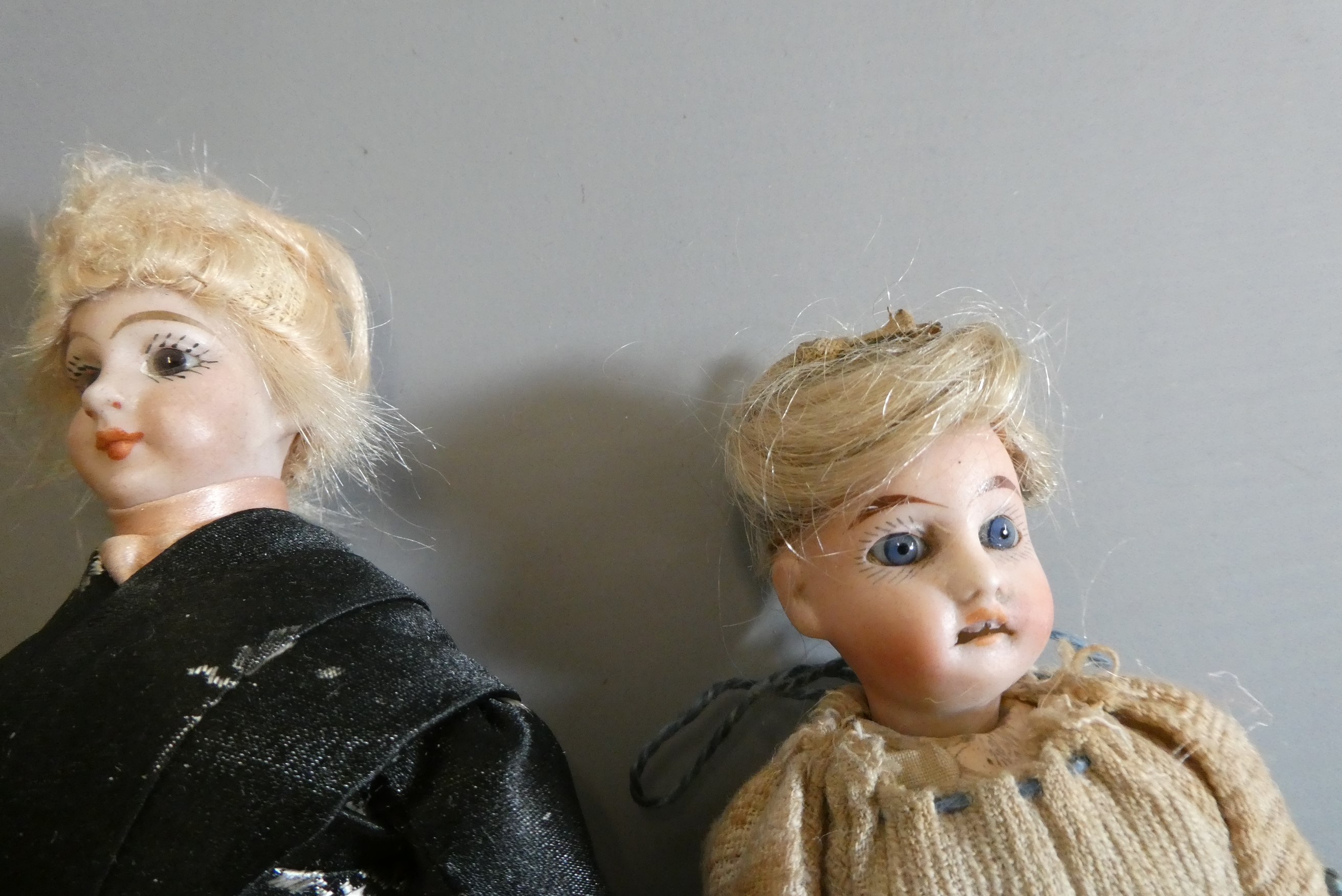Three doll's house dolls Image