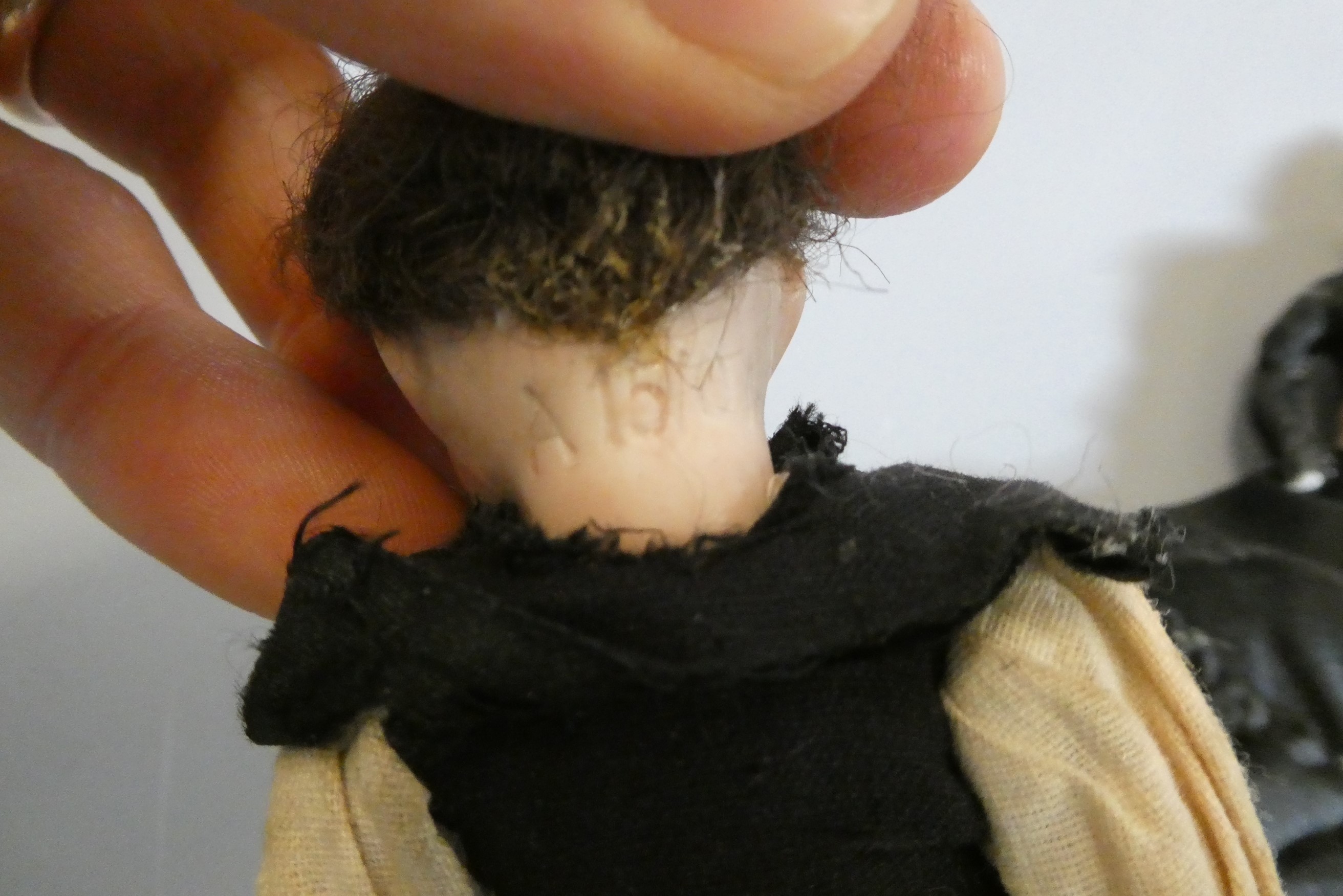 Three doll's house dolls Image