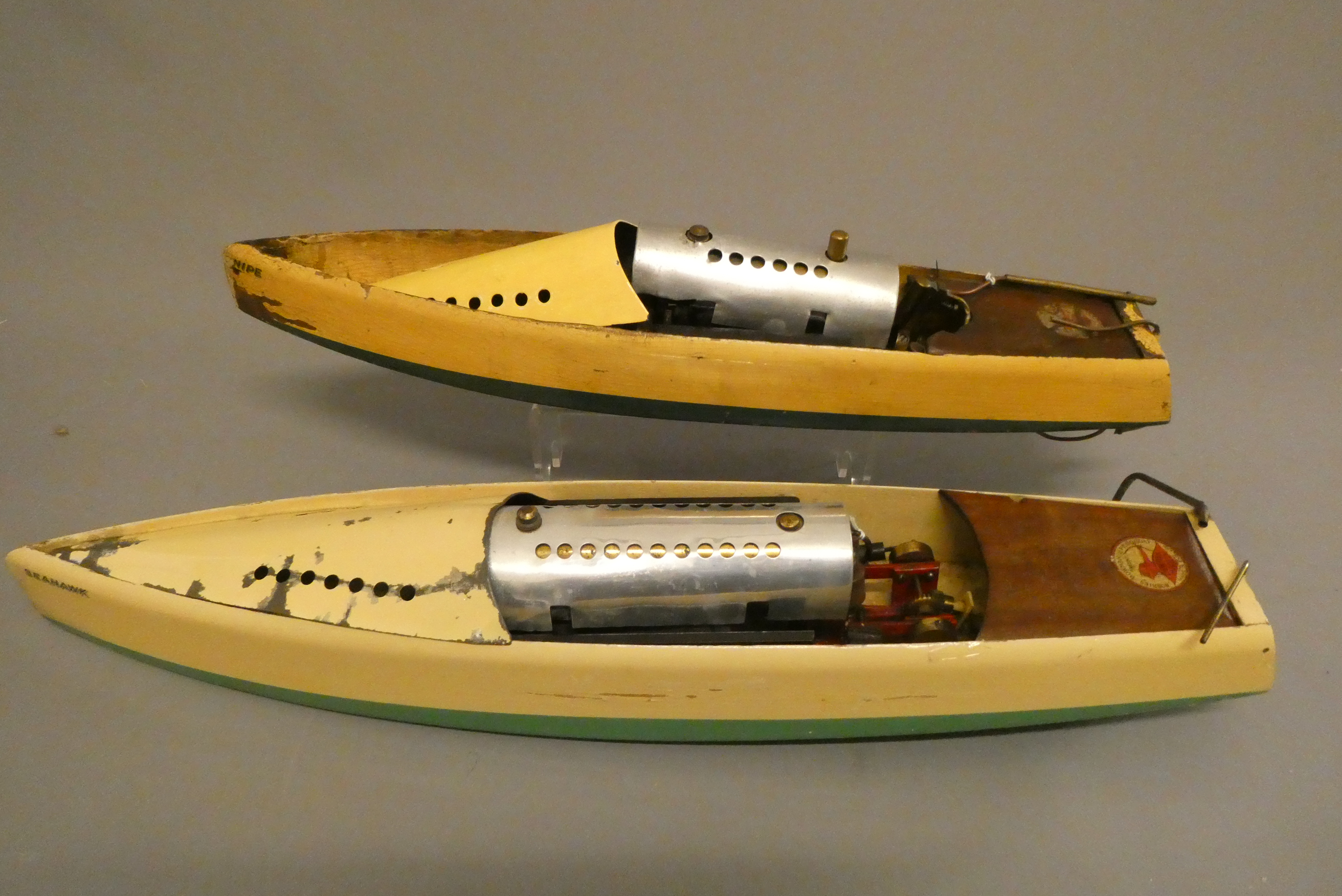Two playworn Bowman steam boats finished in cream and blue Sprite and large hull twin cylinder Image
