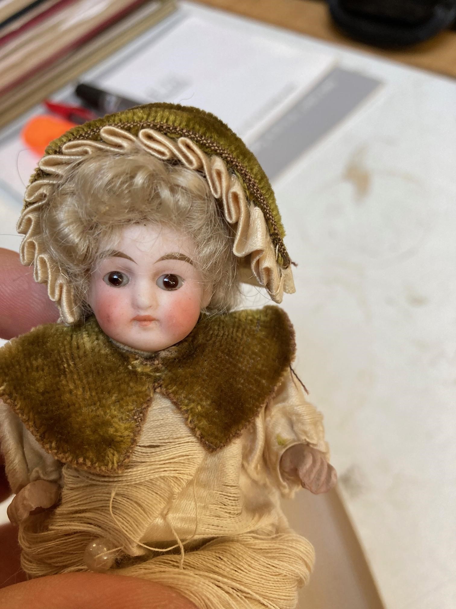 Three all bisque doll's house dolls Image