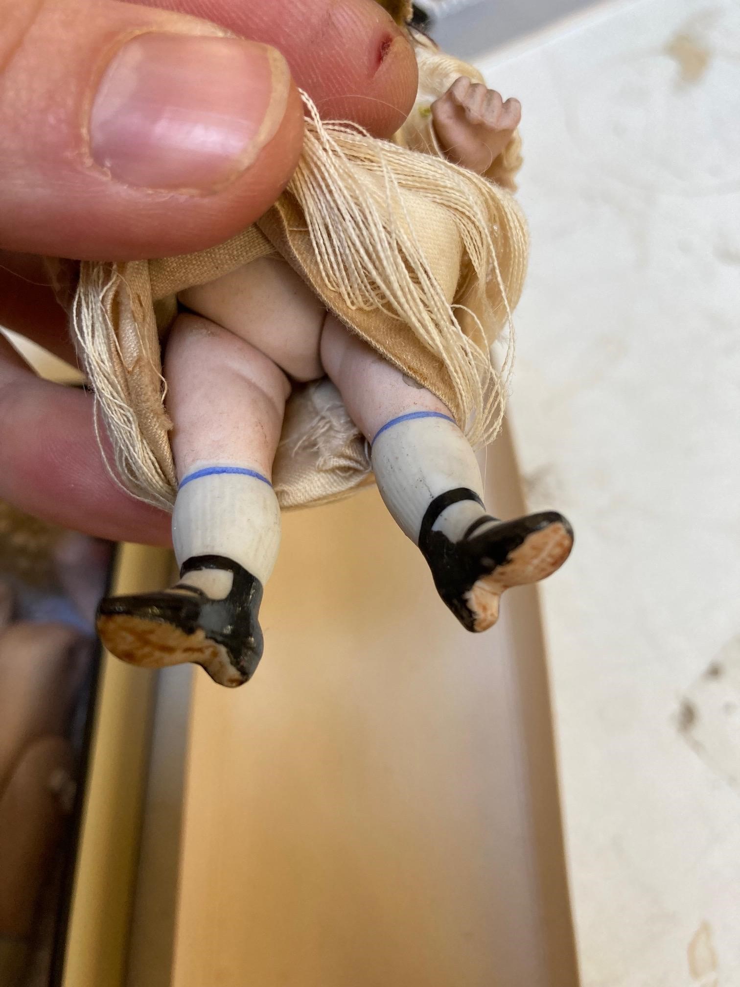 Three all bisque doll's house dolls Image