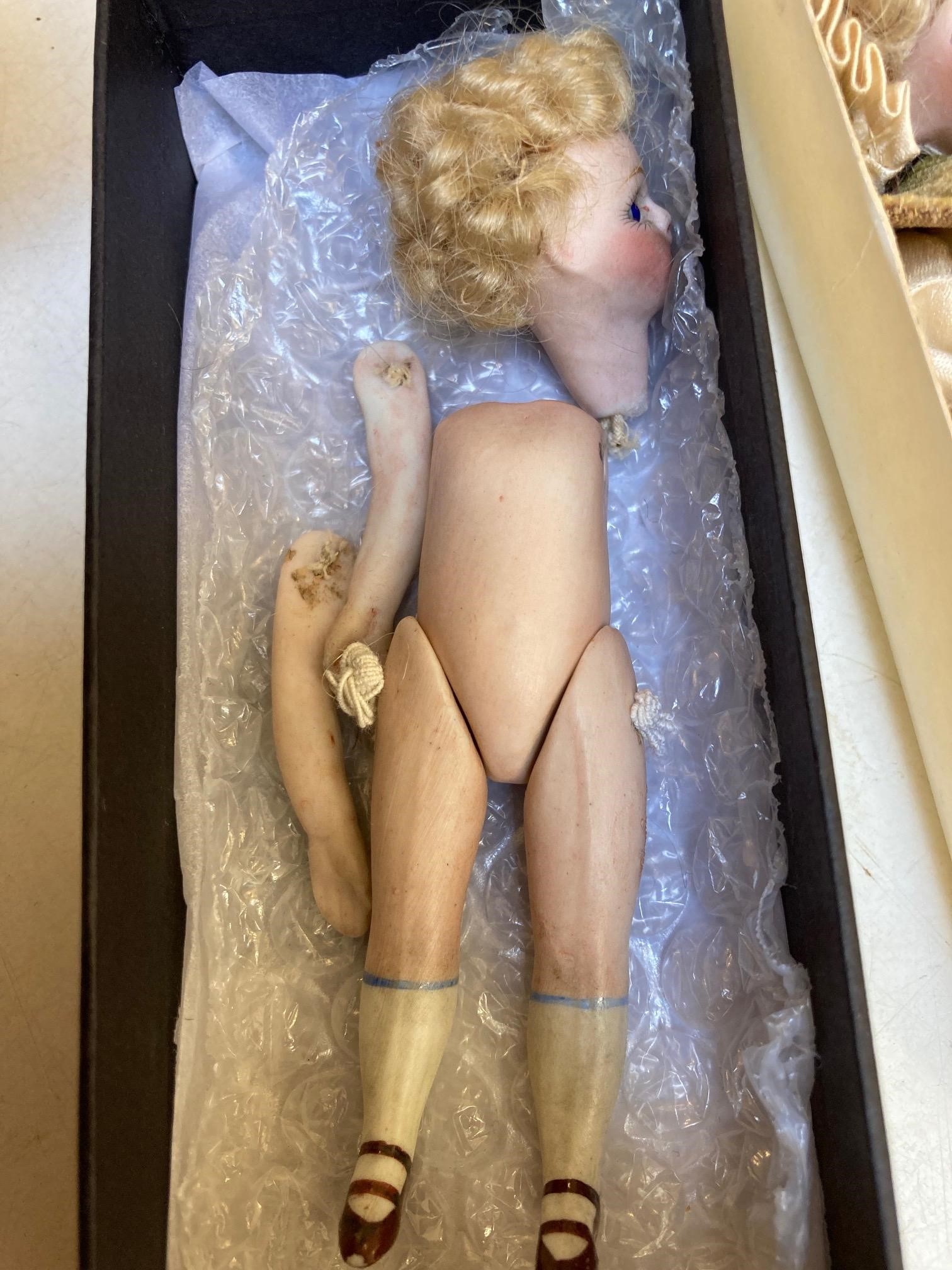 Three all bisque doll's house dolls Image