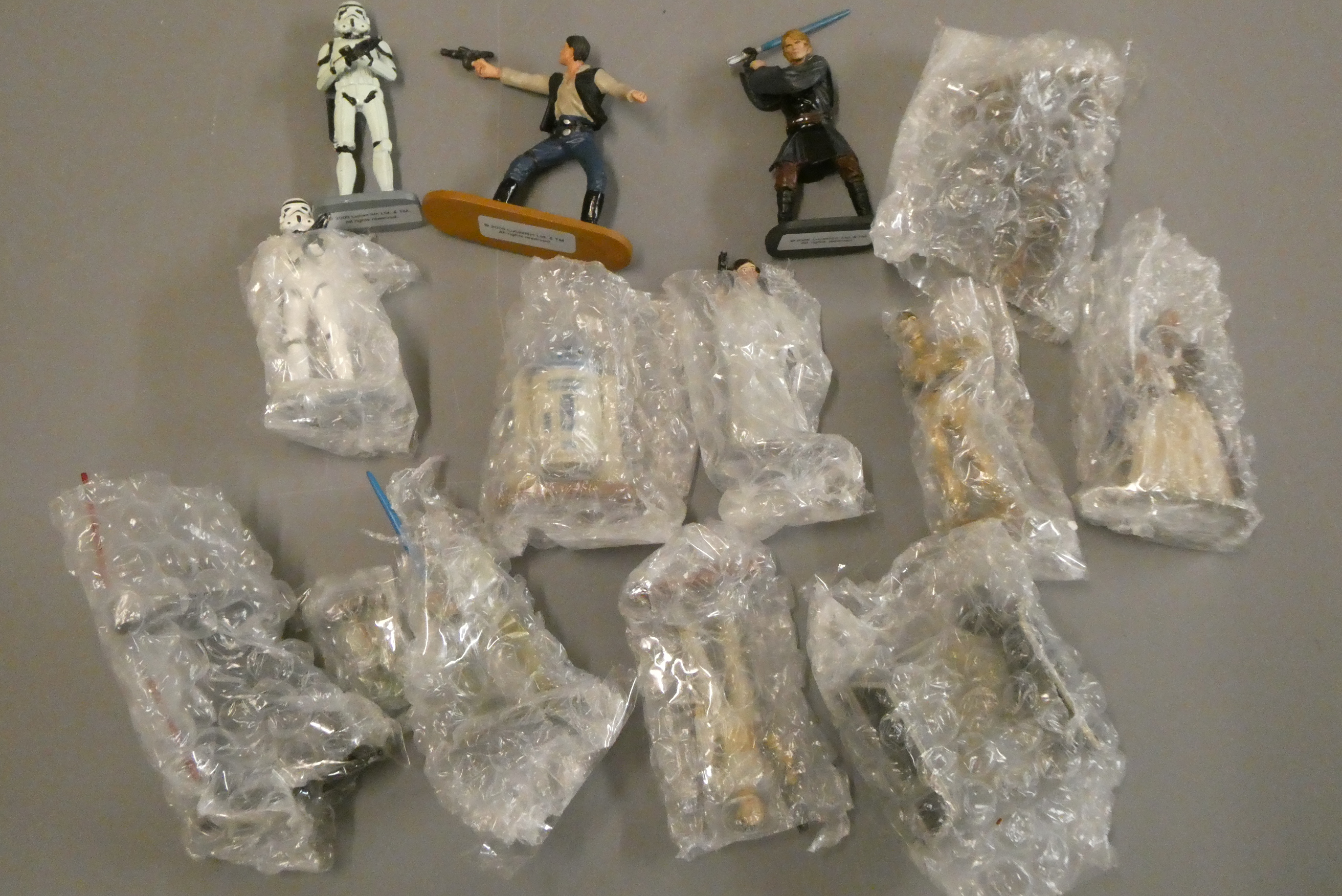 Fourteen loose Lucas Films solid cast Star Wars collectable figures Image