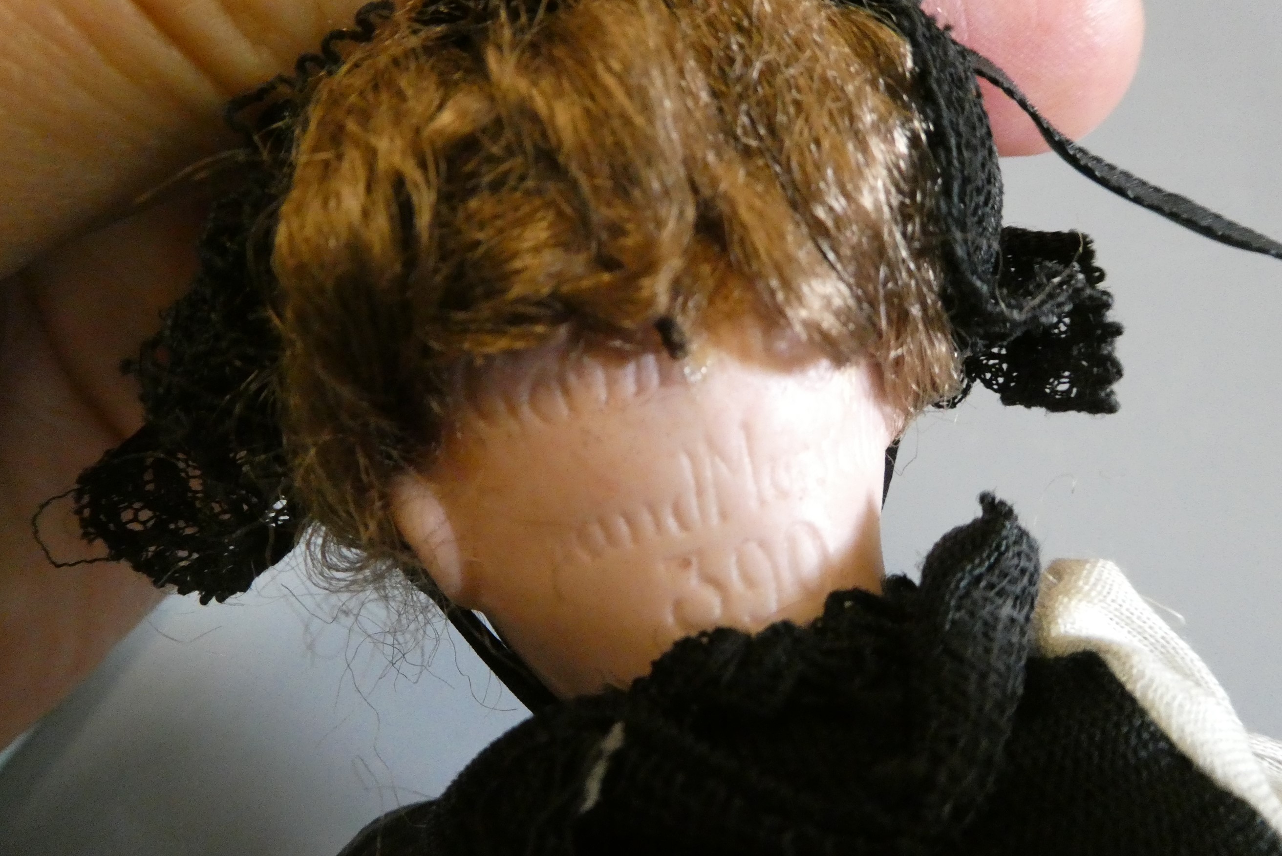 Two small Armand Marseille bisque socket head dolls Image