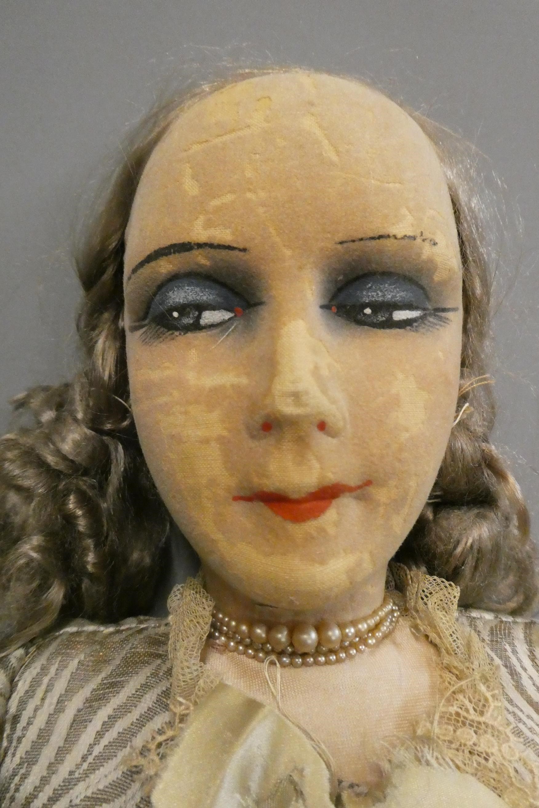 Two vintage felt head dolls Image