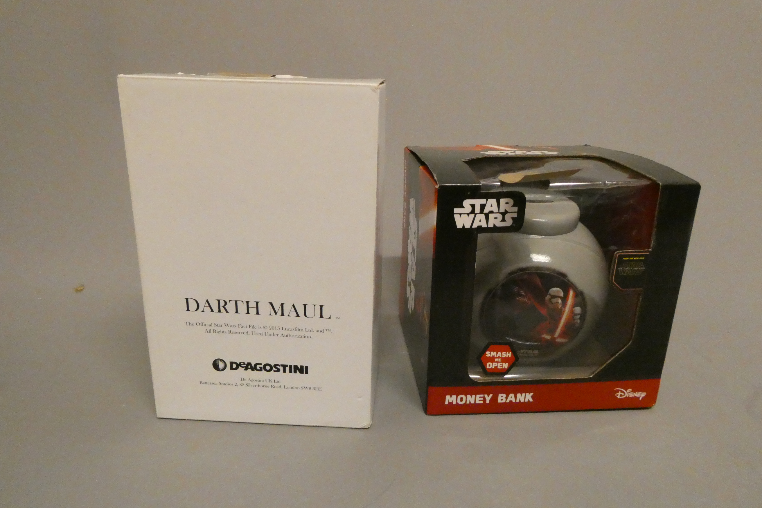 Star Wars moon shape money bank and De Agostini Star Wars Darth Maul 200mm figure, both items boxed, Image