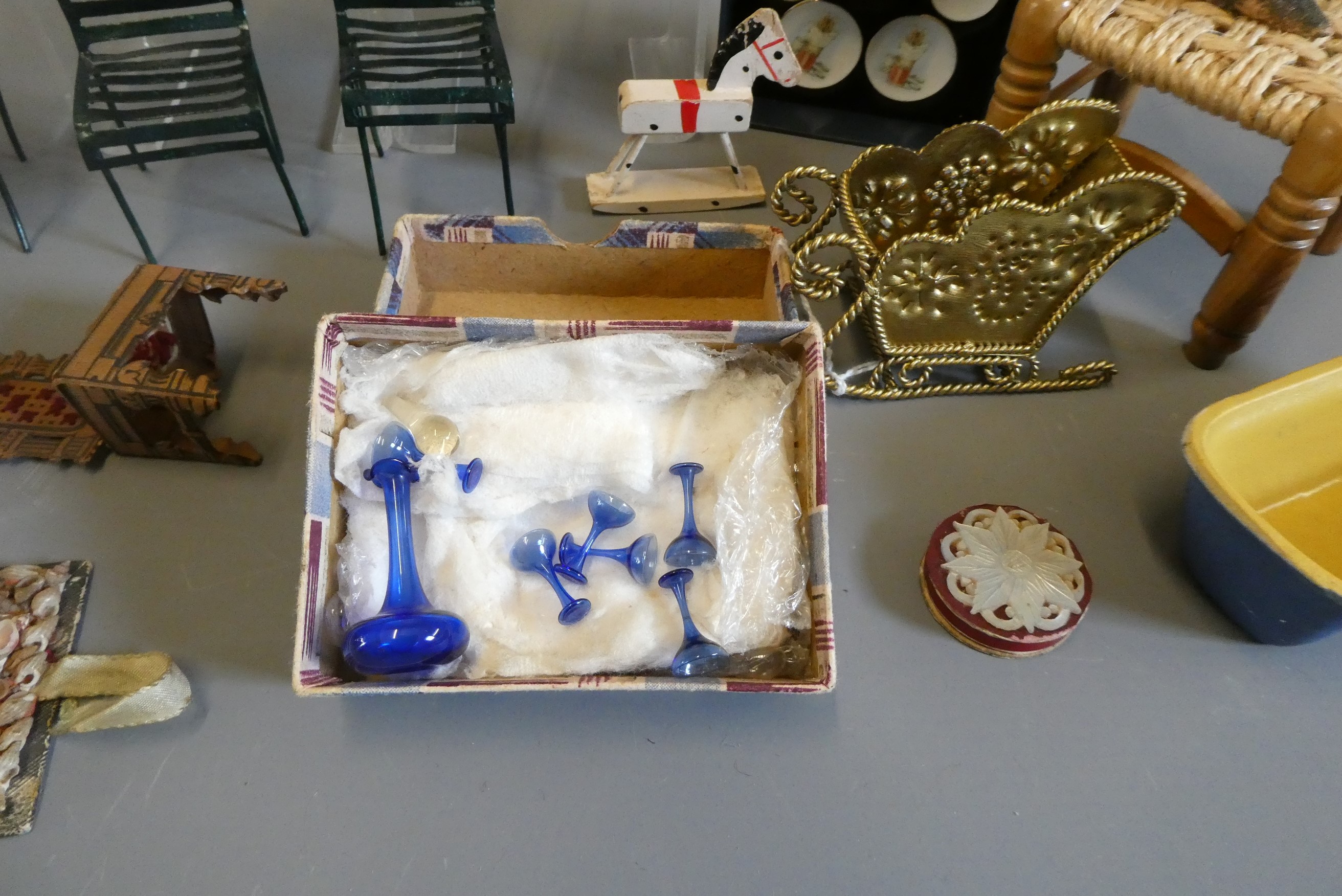 A box of vintage doll's house furniture and accessories Image