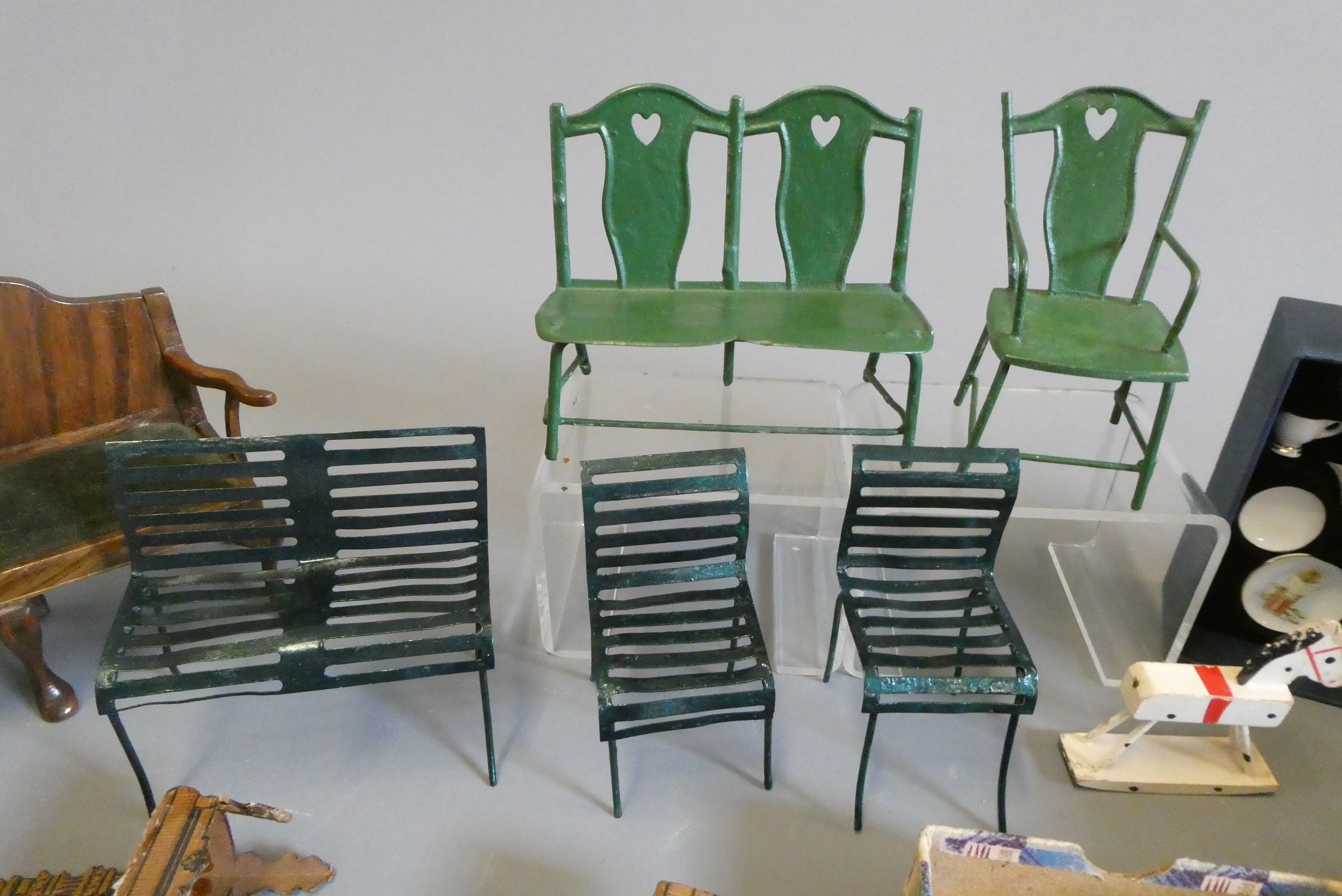 A box of vintage doll's house furniture and accessories Image