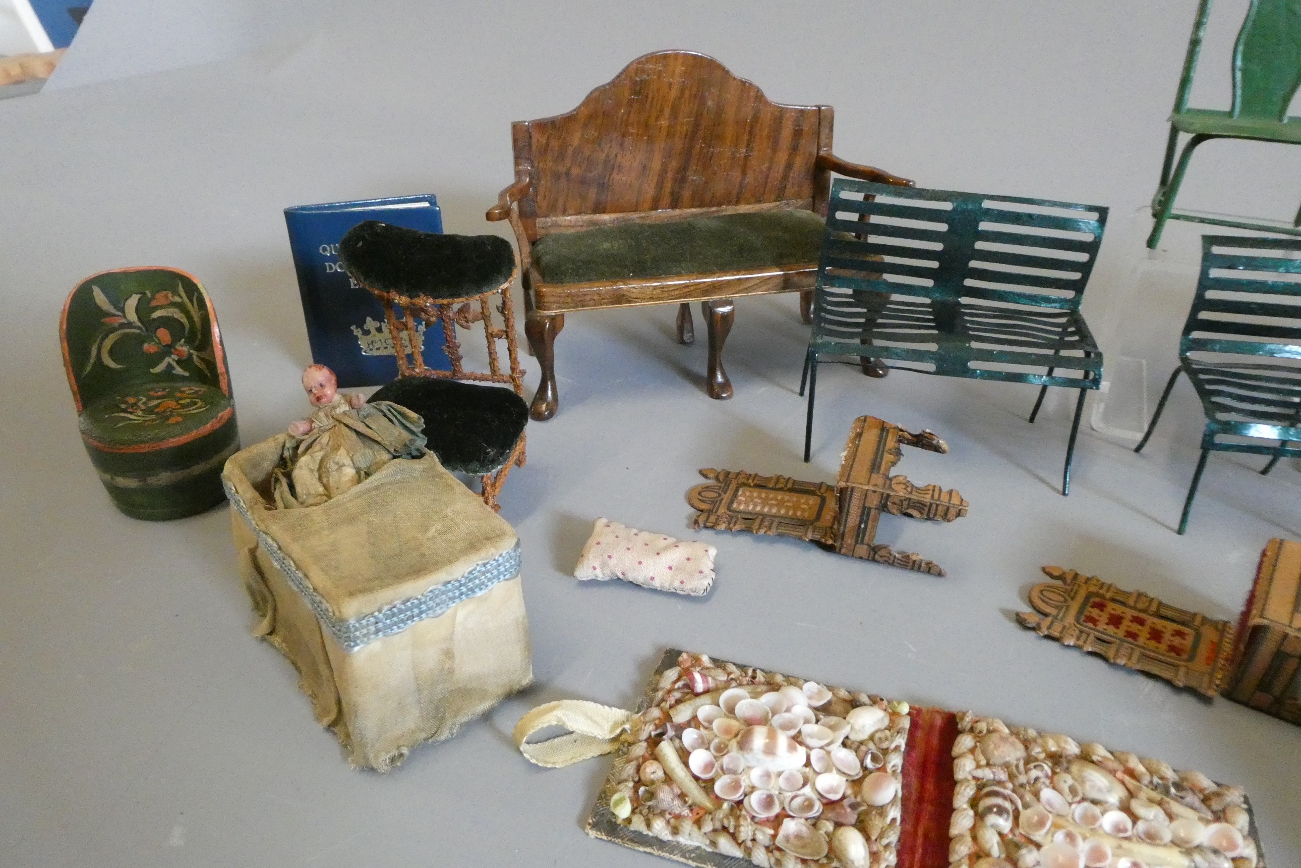 A box of vintage doll's house furniture and accessories Image