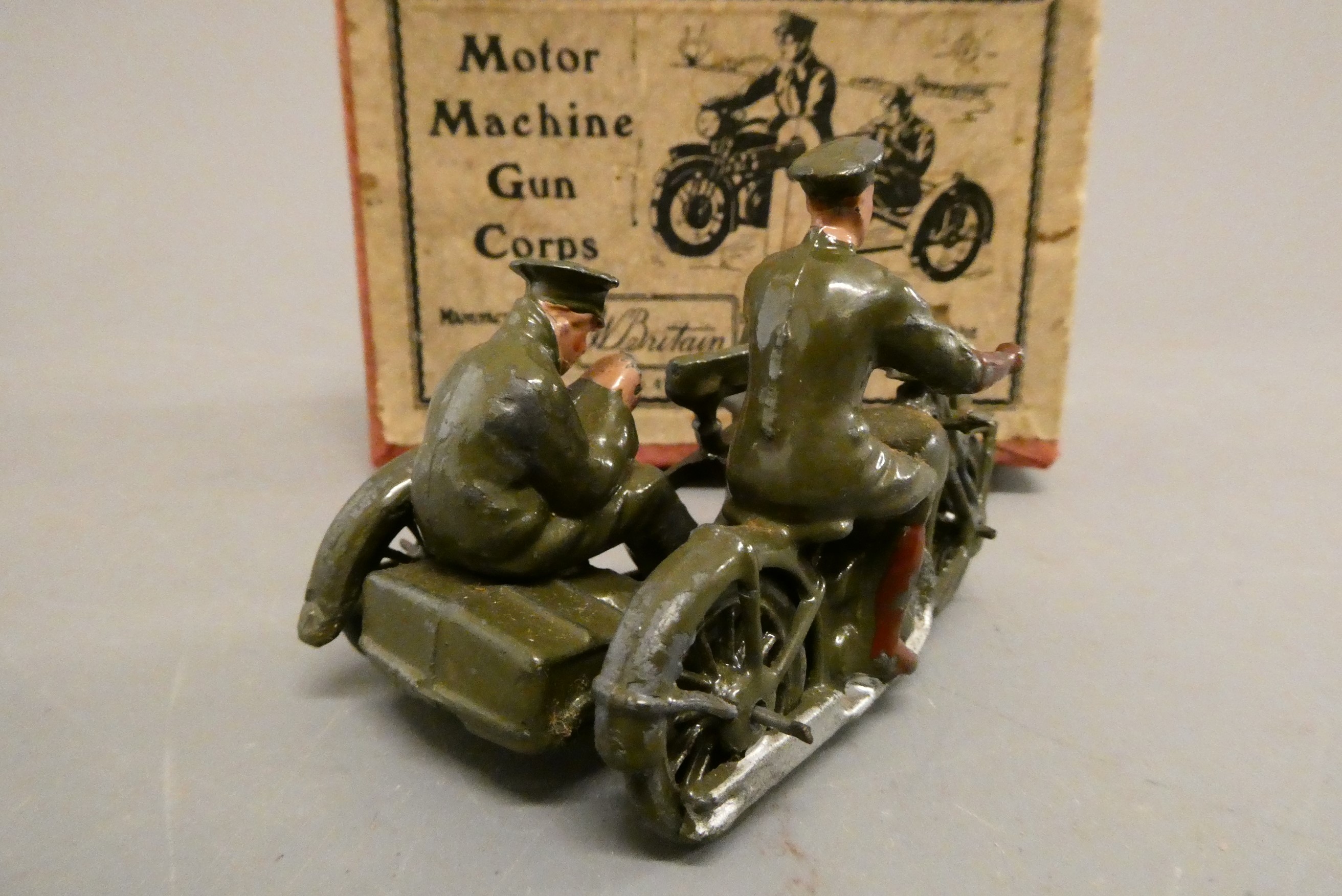 Britains motor machine gun corps motorcycle and gunner, boxed, fair (Est. plus 24% buyer's premium Image