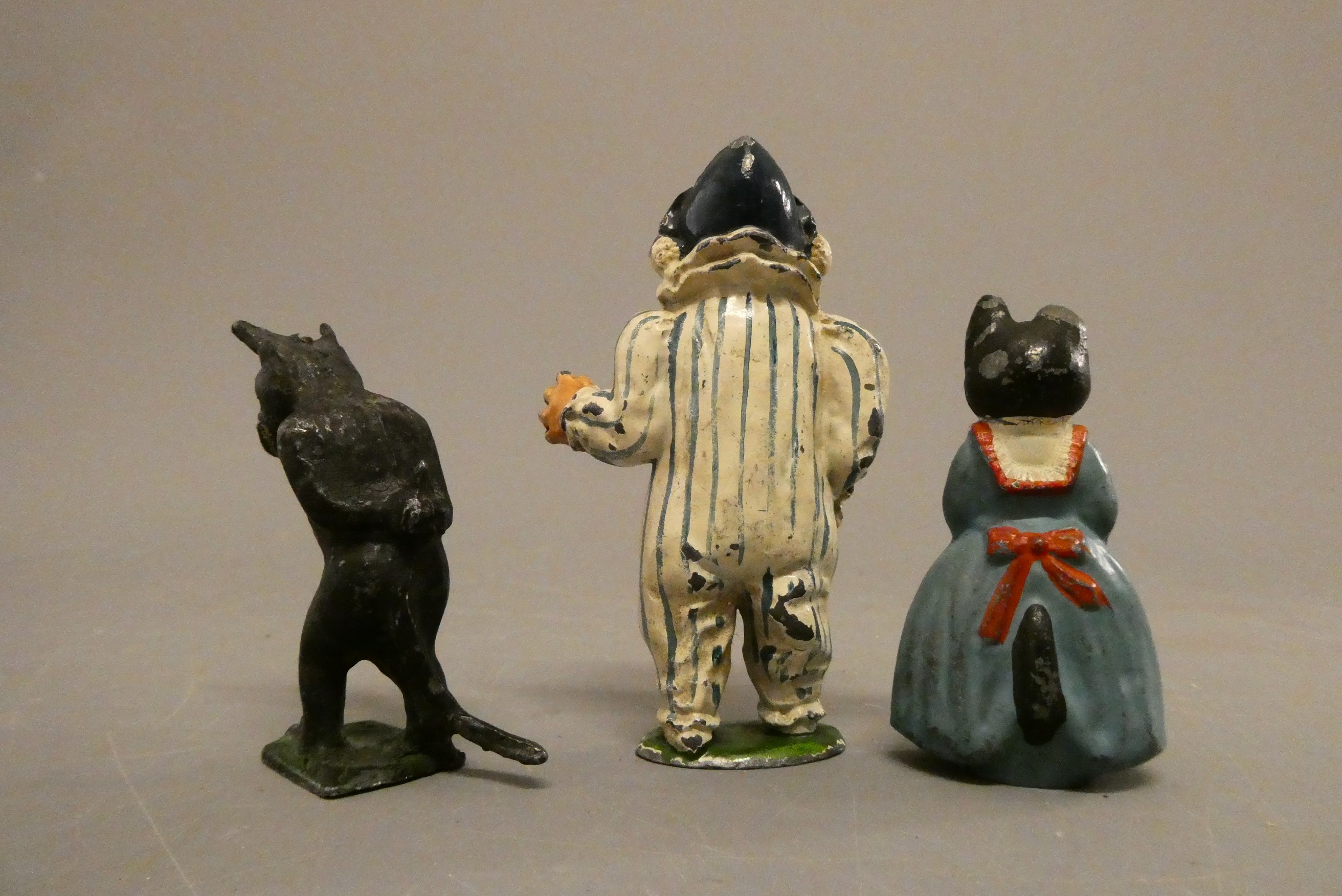 Three hollow cast lead figures comprising Sacul Andy Pandy, female cat in dress and walking Felix Image