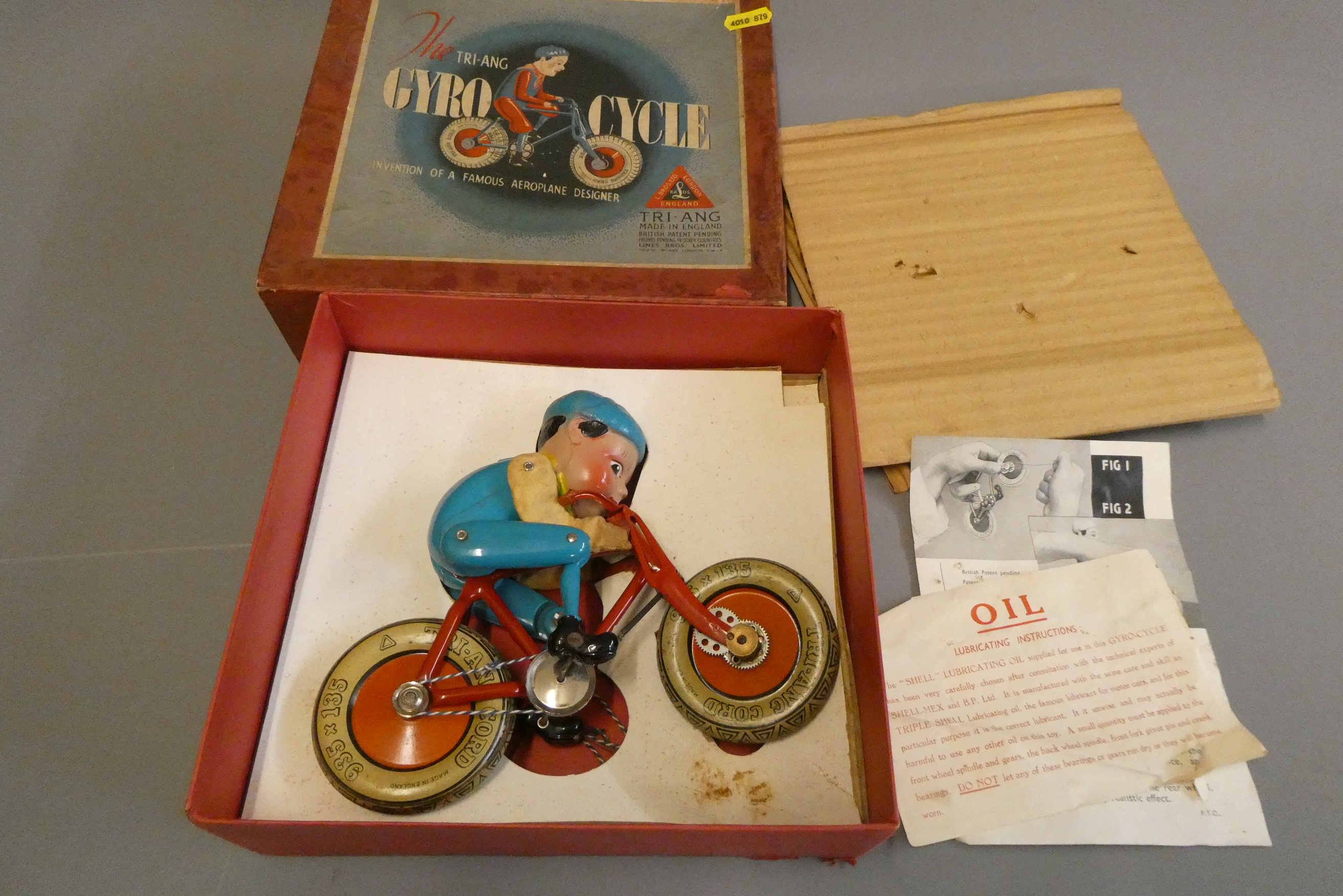 Tri-ang Giro Cycle, boxed with instruction sheets and packing. Some age wear, rubber hands fatigued, Image