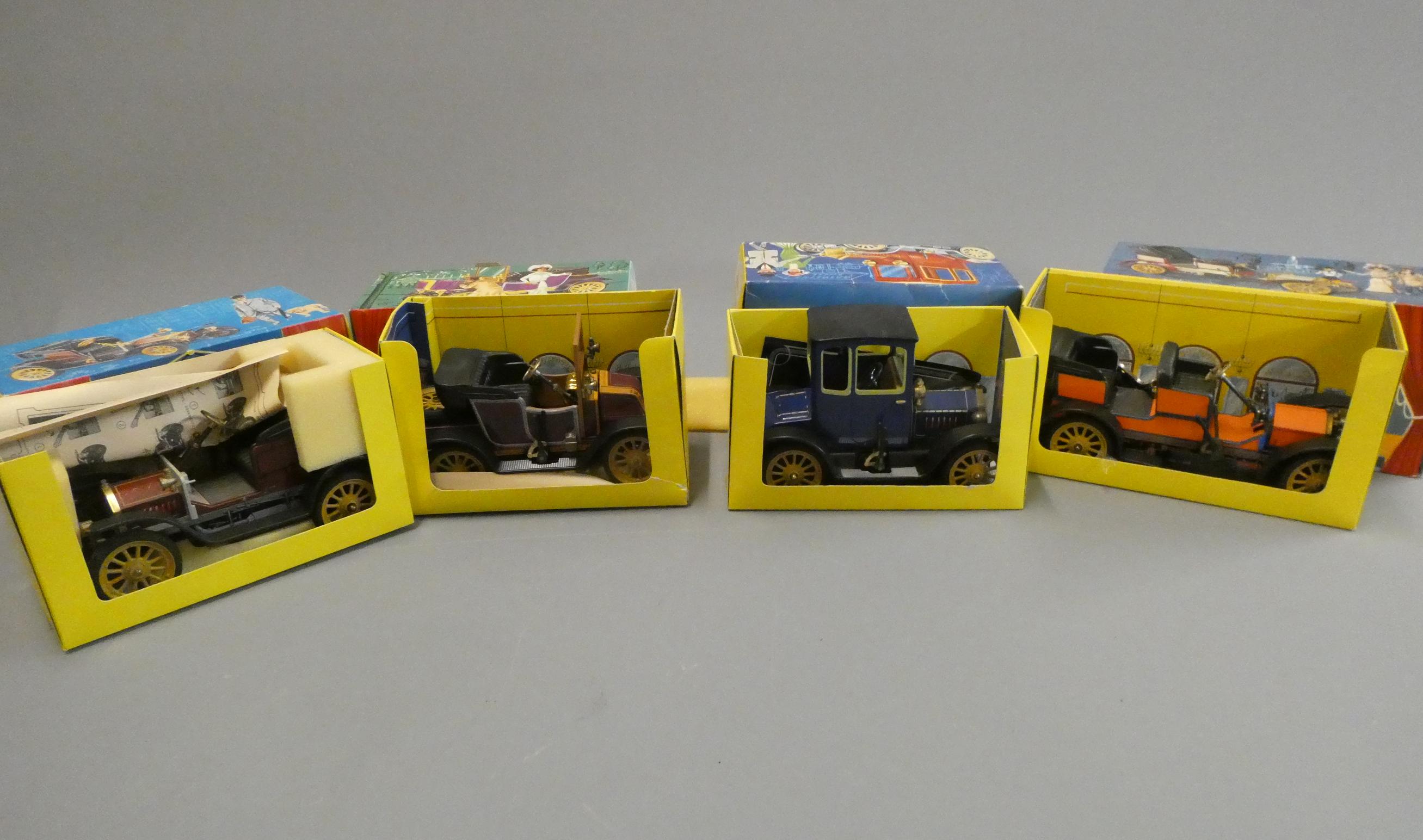 Four Schuco tinplate veteran cars comprising Ford model T, Doktor, Mercedes and Renault, all items Image