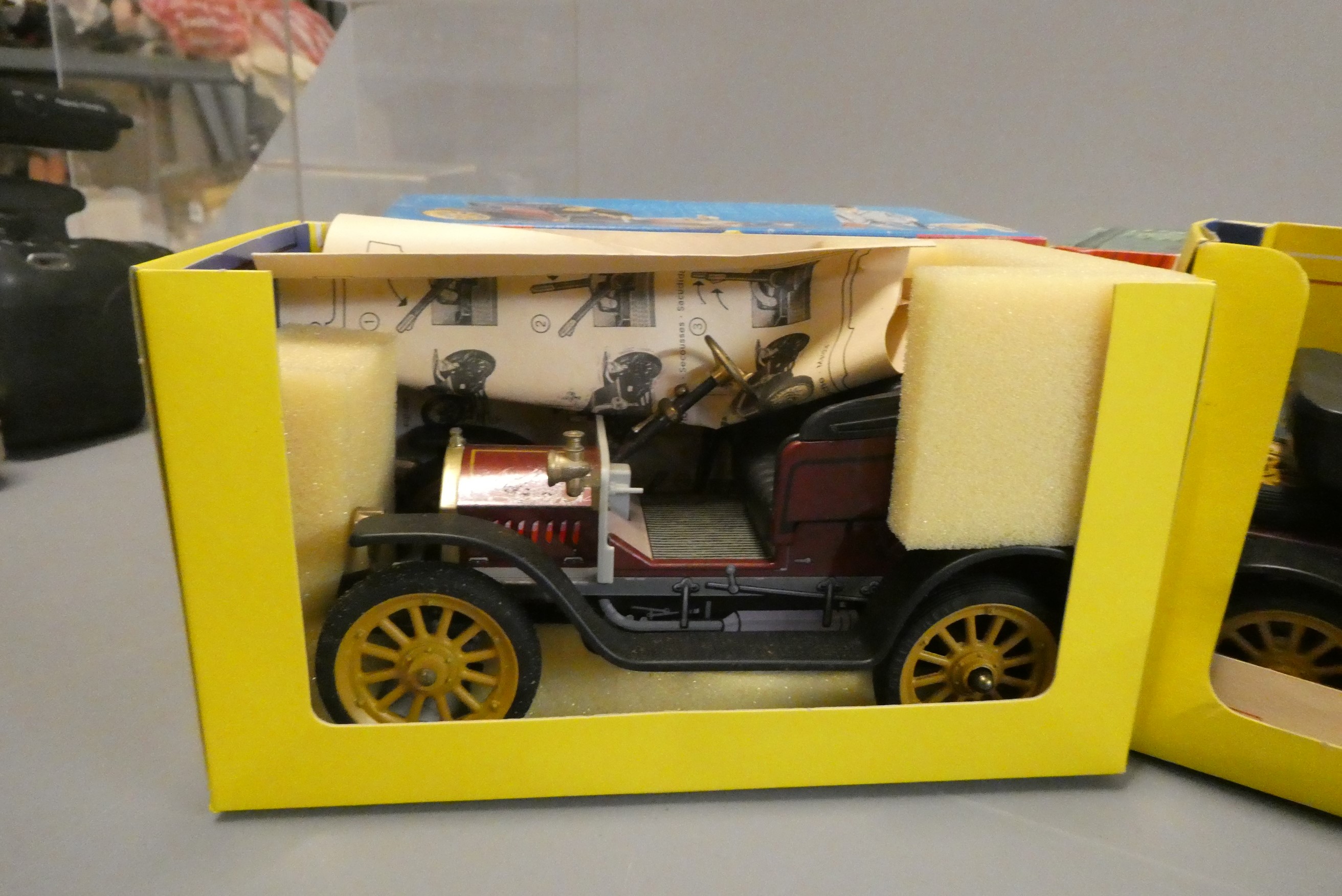 Four Schuco tinplate veteran cars comprising Ford model T, Doktor, Mercedes and Renault, all items Image
