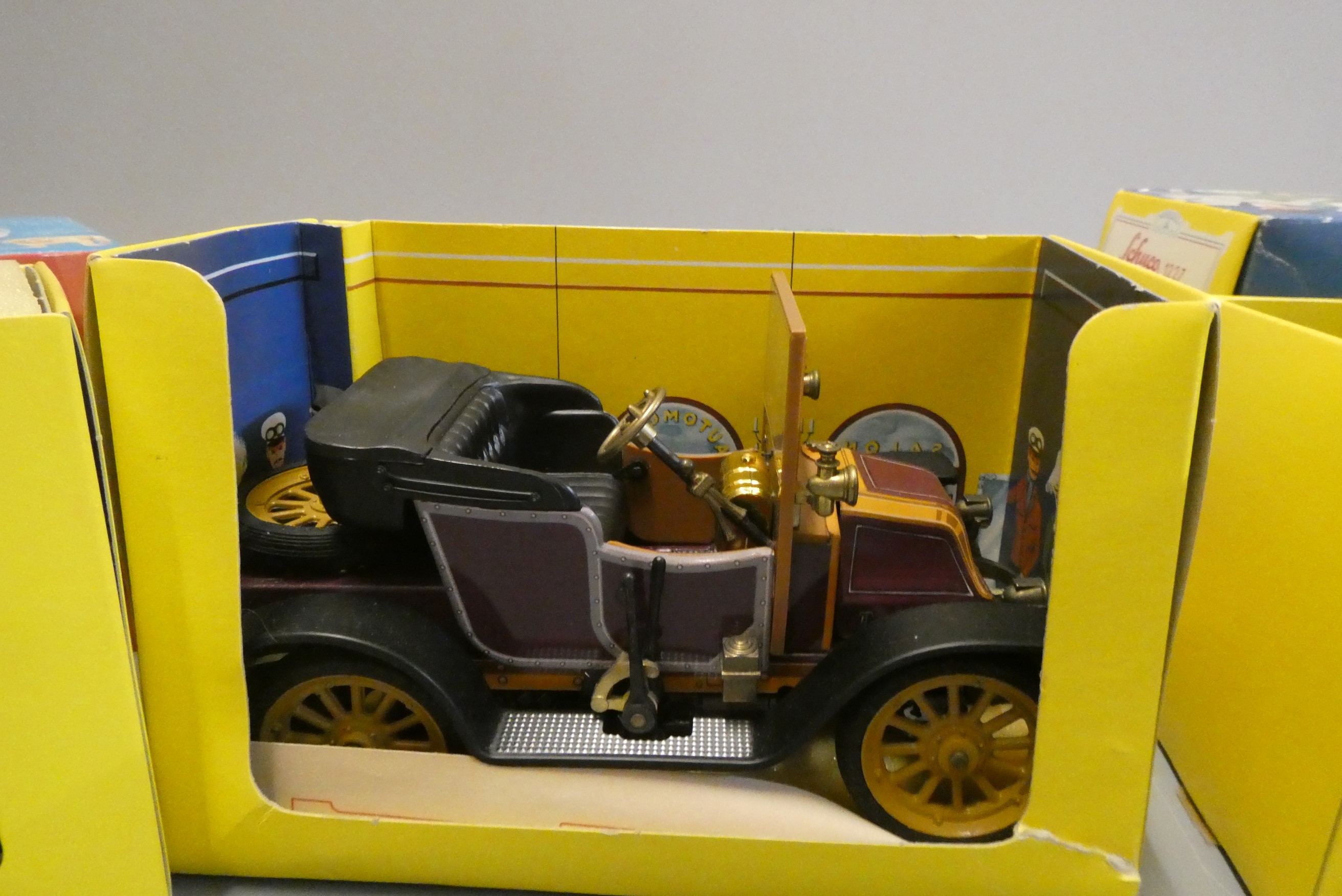 Four Schuco tinplate veteran cars comprising Ford model T, Doktor, Mercedes and Renault, all items Image