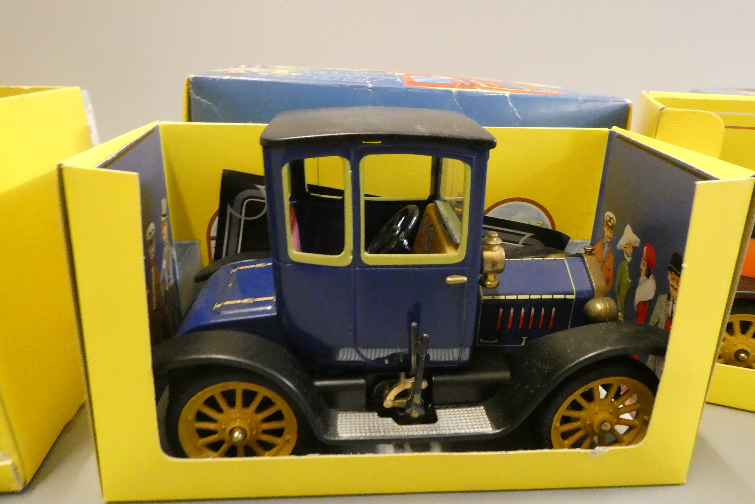 Four Schuco tinplate veteran cars comprising Ford model T, Doktor, Mercedes and Renault, all items Image