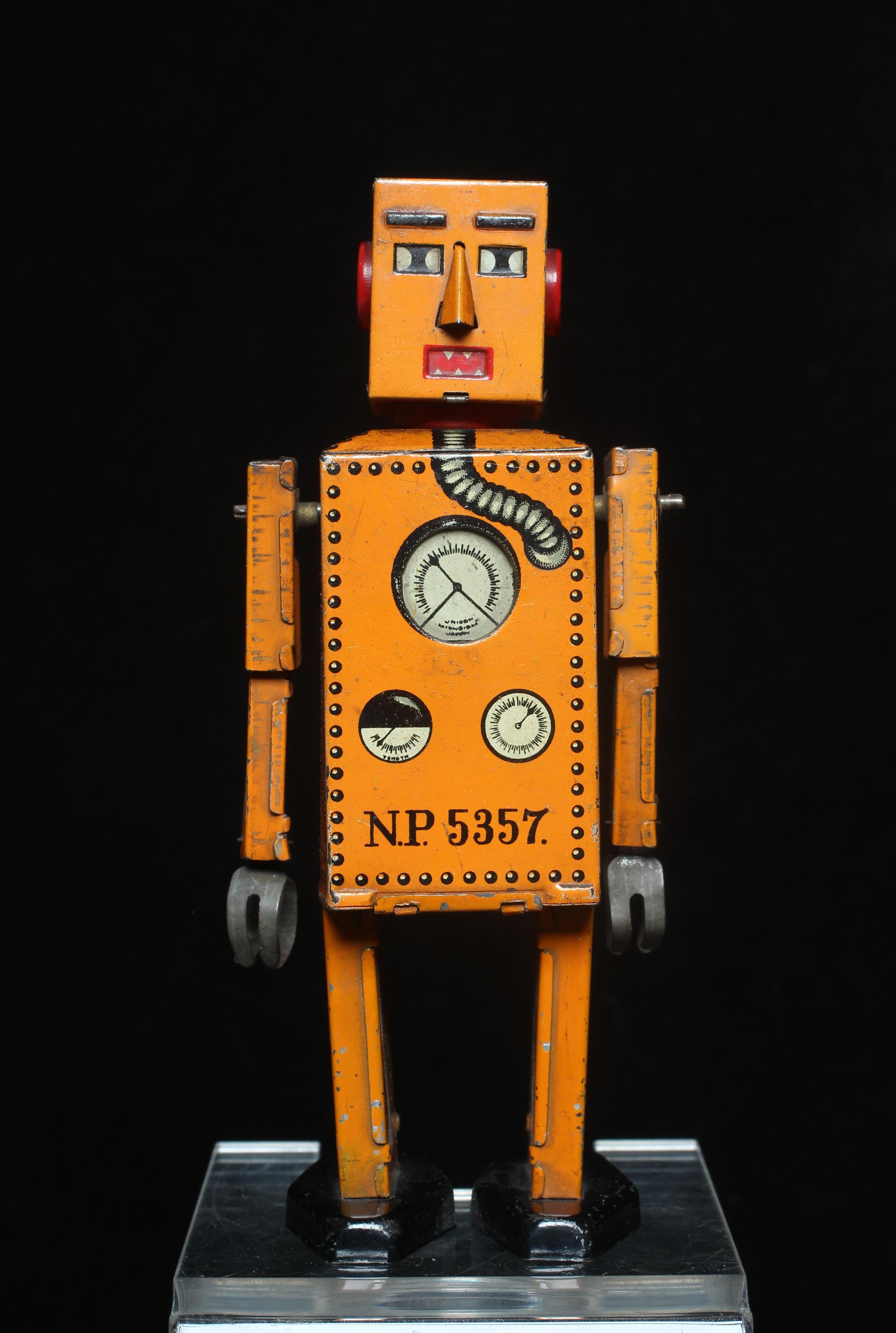 Rare KT toys Japan clockwork robot "Liliput" NP5357 finished in orange with printed detail. Tested Image