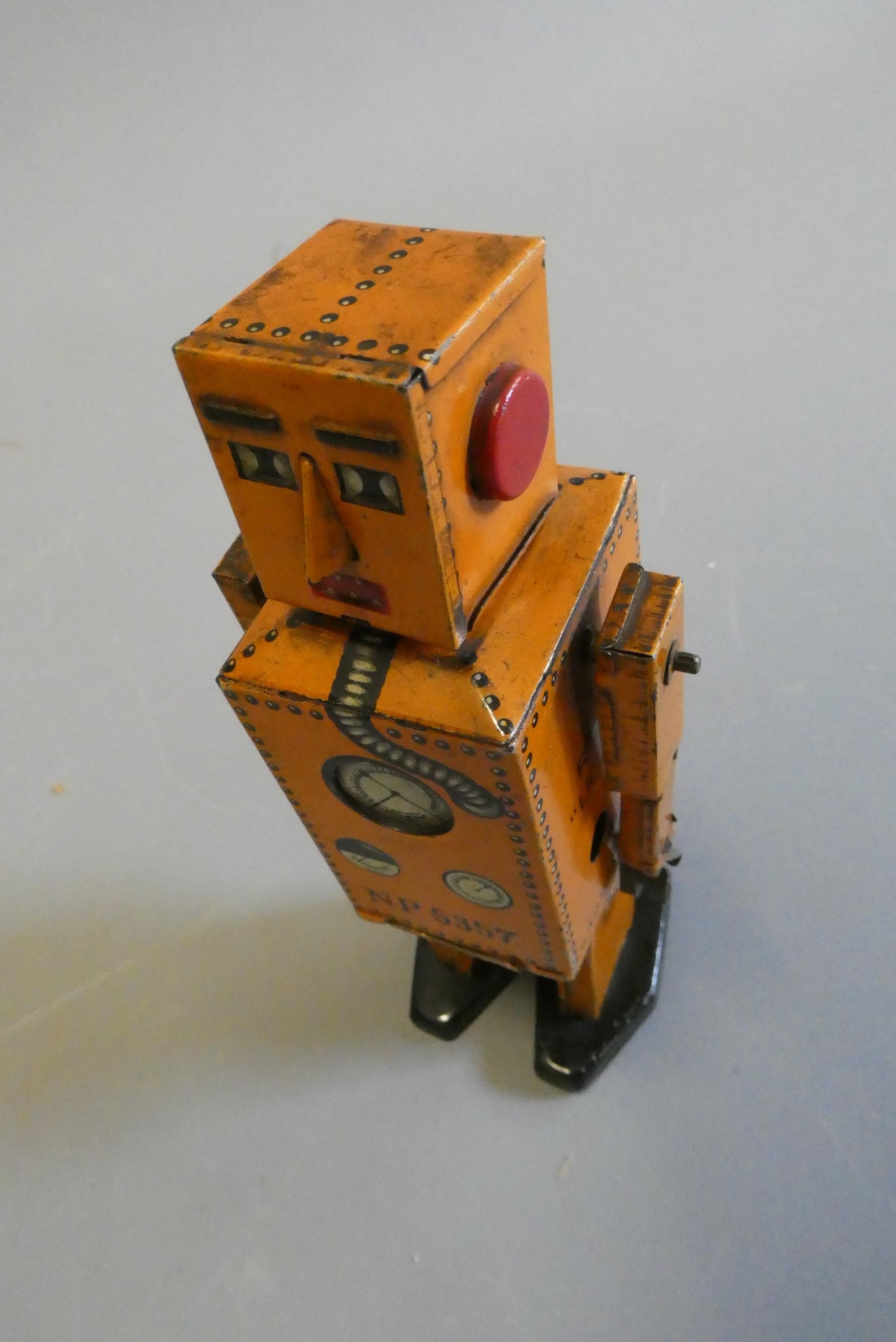 Rare KT toys Japan clockwork robot "Liliput" NP5357 finished in orange with printed detail. Tested Image